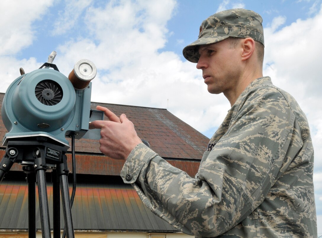 MISAWA AIR BASE, Japan – Maj. David Kempisty, 35th Aerospace Medicine Squadron installation radiation safety officer, shuts off a high-volume air sampler stationed on Misawa Air Base’s flightline April 29. The HVAS is used to detect radioactive particles in the air by collecting 1,000 cubic-feet of air every 50 minutes and trapping the particles on filter paper. Major Kempisty has been monitoring radiation levels here at Misawa since the earthquake and he has not detected any radiation above the normal background levels.  (U.S. Air Force photo/Tech. Sgt. Phillip Butterfield)  