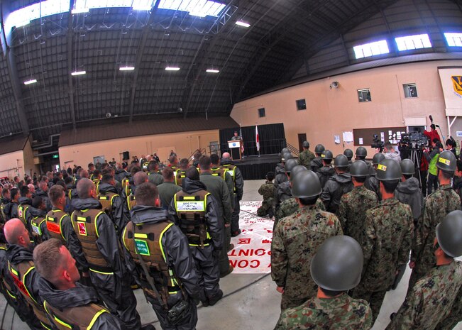 Air Force Lt. Gen. Burton M. Field, commander of the Joint Support Force and the United States Forces, Japan, addresses Marines with the Chemical, Biological Incident Response Force and Japan Ground Self Defense Force members at Yokota Air Base, Japan, prior to Japan's Minister of Defense Toshimi Kitazawa's speech on April 23. Kitazawa and Field were on hand to watch the Marines with the Chemical, Biological Incident Response Force, and the Japanese Ground Self Defense Forces demonstrate their collective ability to work together in a chemical, biological or nuclear environment.::r::::n::::r::::n::::r::::n::