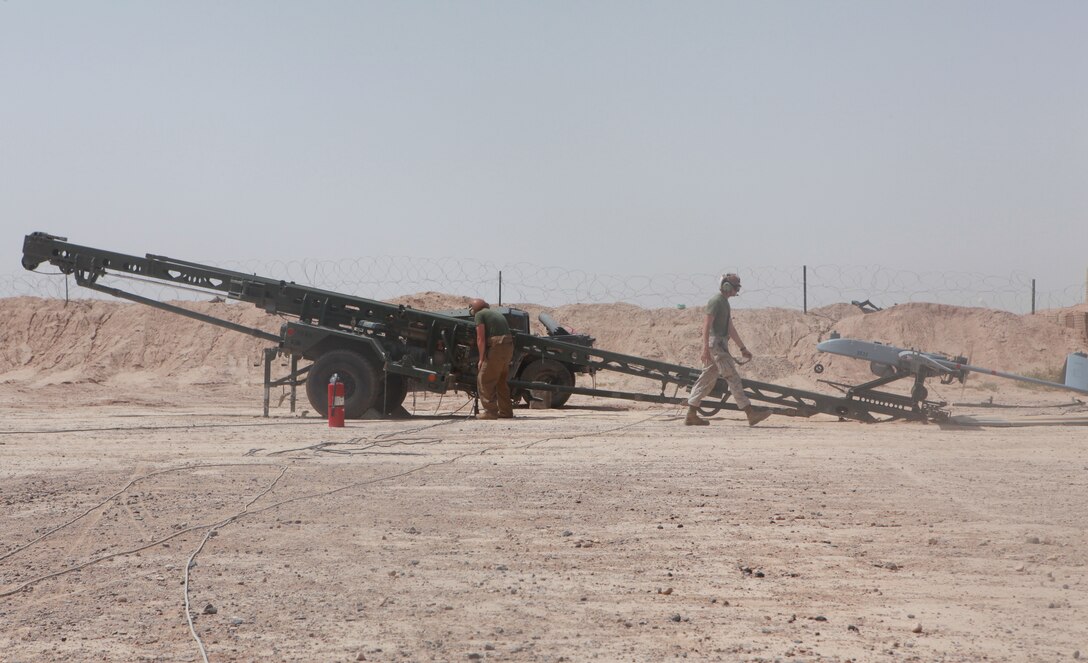 Cpl. Christopher Jones, and unmanned aerial vehicle technician with Marine Unmanned Aerial Vehicle Squadron 3, prepares an RQ-7B Shadow UAV for launch from Camp Dwyer, Afghanistan, April 30. Marine Unmanned Aerial Vehicle Squadron 3, deployed out of Twentynine Palms, Calif., took the duties of providing Marine Corps UAV support in Nimroz and Helmand provinces, May 7.