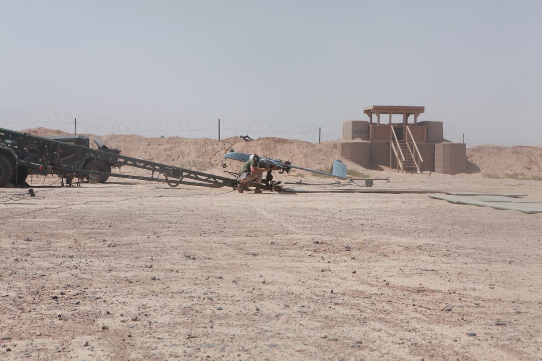 Cpl. Christopher Jones, and unmanned aerial vehicle technician with Marine Unmanned Aerial Vehicle Squadron 3, prepares an RQ-7B Shadow UAV for launch from Camp Dwyer, Afghanistan, April 30. Marine Unmanned Aerial Vehicle Squadron 3, deployed out of Twentynine Palms, Calif., took the duties of providing Marine Corps UAV support in Nimroz and Helmand provinces, May 7.