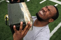 Winona State Warrior running back Rayon Simmons knocks out one more ammo can lift before time runs out while taking a modified combat fitness test at Maxwell Field April 30. Simmons, a University City, Mo., native, is a junior at Winona State University. Mankato and Rochester recruiters proctored the modified combat fitness test. For more photos of the event, visit www.facebook.com/rstwincities.