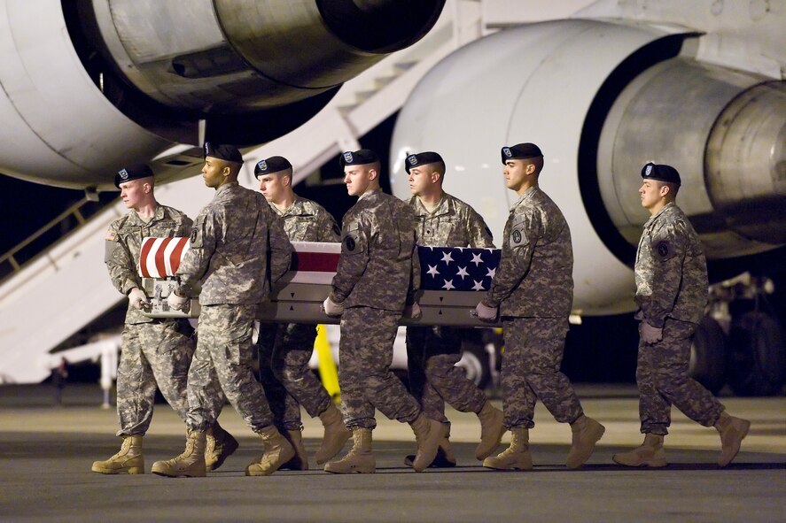A U.S. Army carry team transfers the remains of Army Pfc. Jonathan M. Villanueva, of Jacksonville, Fla., at Dover Air Force Base, Del., April 30, 2011. Villanueva was assigned to the 2nd Battalion, 4th Infantry Regiment, 4th Brigade Combat Team, 10th Mountain Division, Fort Polk, La. (U.S. Air Force photo/Roland Balik)