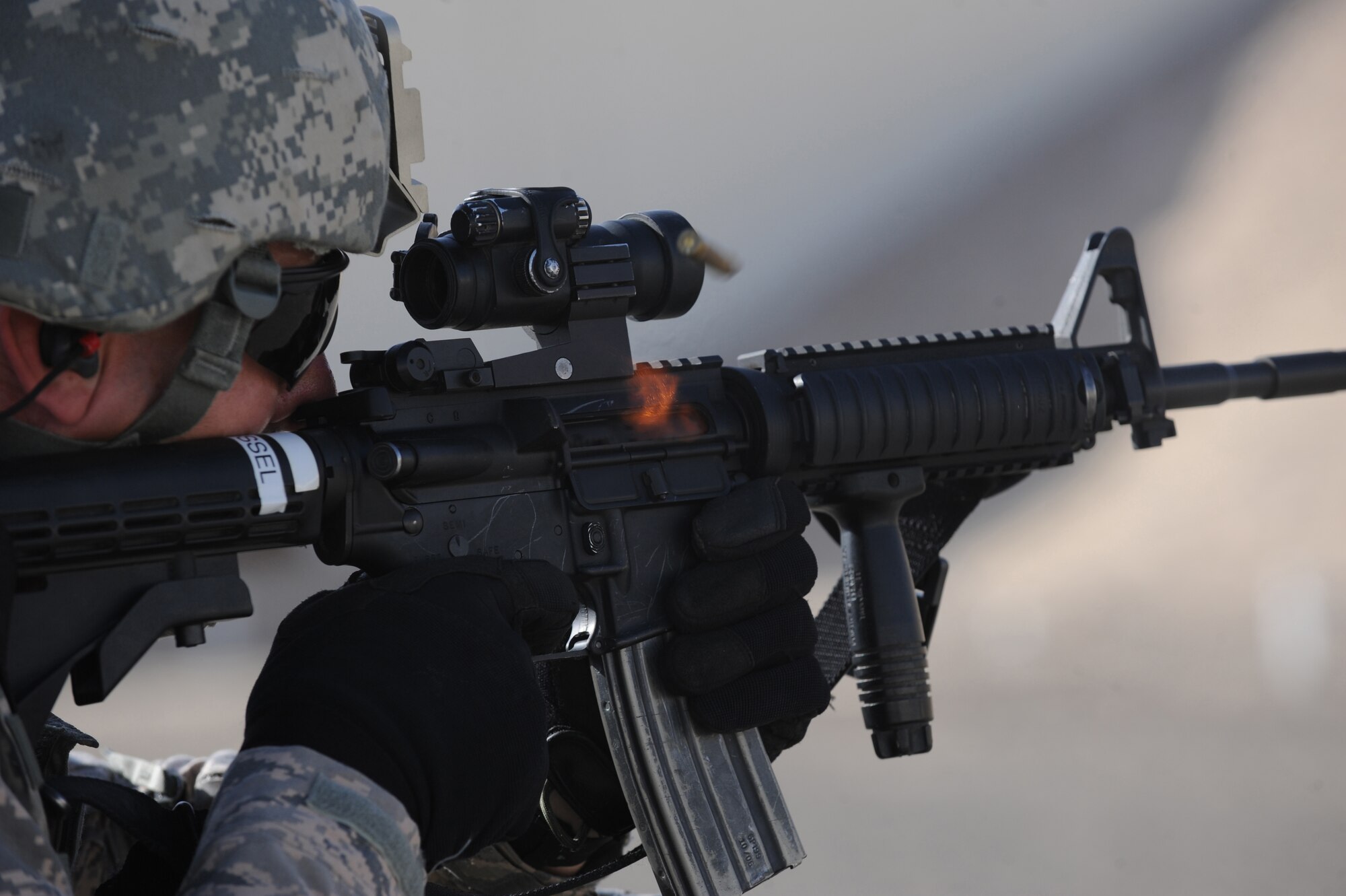 Maj. Damien Schlussel, 380th Expeditionary Security Forces Squadron commander, fires his weapon during target practice Mar. 4, 2011, in Southwest Asia. Security Forces must remain up to date on all training to prepare them for quick response to any real world situation, anytime. (U.S. Air Force photo by Senior Airman Maynelinne De La Cruz)