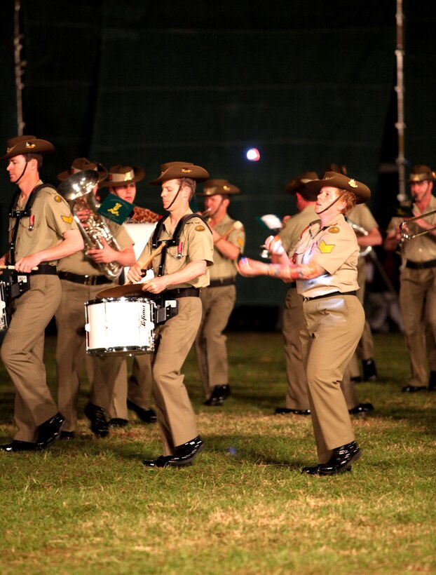 The Australian Army Band Kapooka shows a lighthearted display of musical theatrics while playing popular Aussie tunes during the Kingdom of Tonga Military Parade and Tattoo, Aug. 2. A Tattoo is comprised of military units – musical and operational – from different countries collaborating in an extensive exhibition of musical performances and demonstrating military capabilities.
