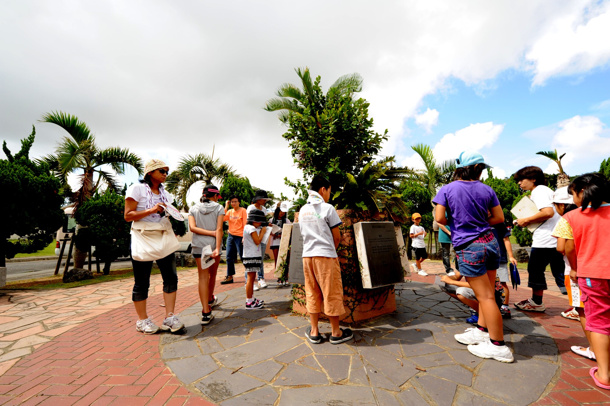 Participants from the Misato area Kodomo-Kai children's group visit World War II historical sites July 29, Kadena Air Base, Japan. The group partake in the annual peace education event organized by Misato Residents' Association during the summer vacation. (U.S. Air Force photo/Airman 1st Class Jarvie Z. Wallace)
