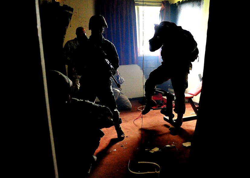 During the Combat Readiness Course, 51st Security Forces and Republic of Korea Air Force members were challenged, when an airman from [their] quick reaction team was captured and held hostage.  This is just one of many scenarios given while successfully completing the extensive course.  The Airmen executed troop movement maneuvers, communication tactics, contact left/right, room clearing and hostage extraction.  Security Forces members are responsible for ensuring the safety of bases, weapons, property and personnel from hostile forces. (U.S. Air Force Photo by/Staff Sgt. Daylena Gonzalez) 