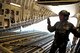 U.S. Air Force Master Sgt. Tim Ledford, a loadmaster from Joint Base Pearl Harbor-Hickam, Hawaii, preps a C-17 Globemaster III before a contest during Air Mobility Rodeo 2011 at Joint Base Lewis-McChord, Wash., July 27. Air Mobility Rodeo is the U.S. Air Force's and Air Mobility Commandís premier international combat skill and flying operations competition designed to develop and improve techniques, procedures and interoperability, while optimizing international mobility partnerships and enhancing mobility operations. (U.S. Air Force photo/Staff Sgt. Nicholas Pilch)