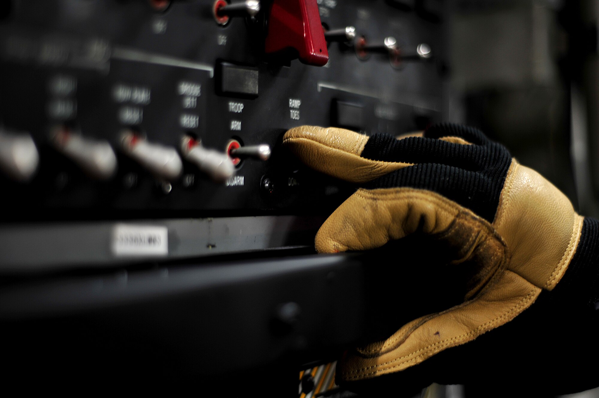 Master Sgt. Mike Evans, a crew chief from Joint Base Pearl Harbor-Hickam, Hawaii, prepares a C-17 Globemaster III before a contest at the 2011 Air Mobility Rodeo at Joint Base Lewis-McChord, Wash., July 27. Air Mobility Rodeo is the U.S. Air Force's and Air Mobility Command's premier international combat skill and flying operations competition designed to develop and improve techniques, procedures and interoperability, while optimizing international mobility partnerships and enhancing mobility operations. (U.S. Air Force photo/Staff Sgt. Nicholas Pilch)