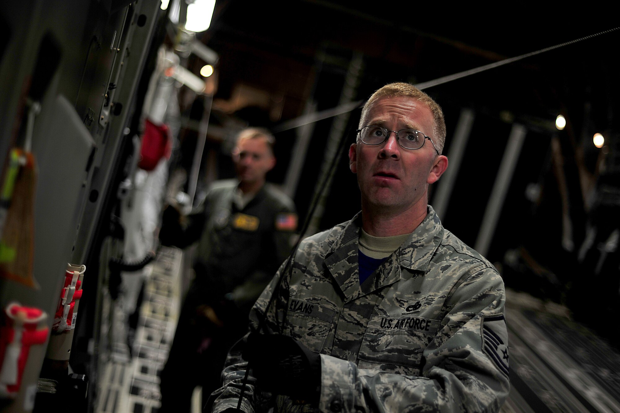 Master Sgt. Mike Evans, a crew chief from Joint Base Pearl Harbor-Hickam, Hawaii, prepares a C-17 Globemaster III before a contest at Air Mobility Rodeo 2011 at Joint Base Lewis-McChord, Wash., July 27. Air Mobility Rodeo is the U.S. Air Force's and Air Mobility Command's premier international combat skill and flying operations competition designed to develop and improve techniques, procedures and interoperability, while optimizing international mobility partnerships and enhancing mobility operations. (U.S. Air Force photo/Staff Sgt. Nicholas Pilch) 