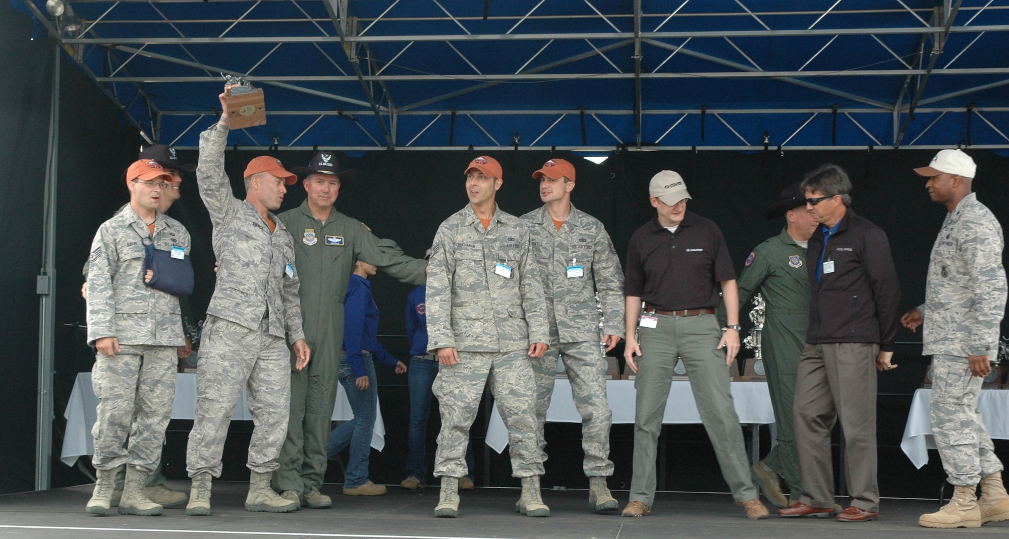 The award for Best Security Forces Combat Weapons went to the Air Force Reserve's 446th Airlift Wing security forces team from McChord Field, Wash July 29.Team members are (left to right) Staff Sgt. Damon Hahn, Tech. Sgt. Christopher Pierce, Staff Sgt. David Buchanan, and Tech. Sgt. Jack Montez.  Air Mobility Rodeo was held July 24-29 at McChord Field, with 150 teams from around the world.  Air Mobility Rodeo is the U.S. Air Force's and Air Mobility Command's premier international combat skills and flying operations competition designed to develop and improve techniques, procedures, and interoperability, while optimizing international mobility partnerships and enhancing mobility operations. (U.S. Air Force photo by Sandra Pishner)