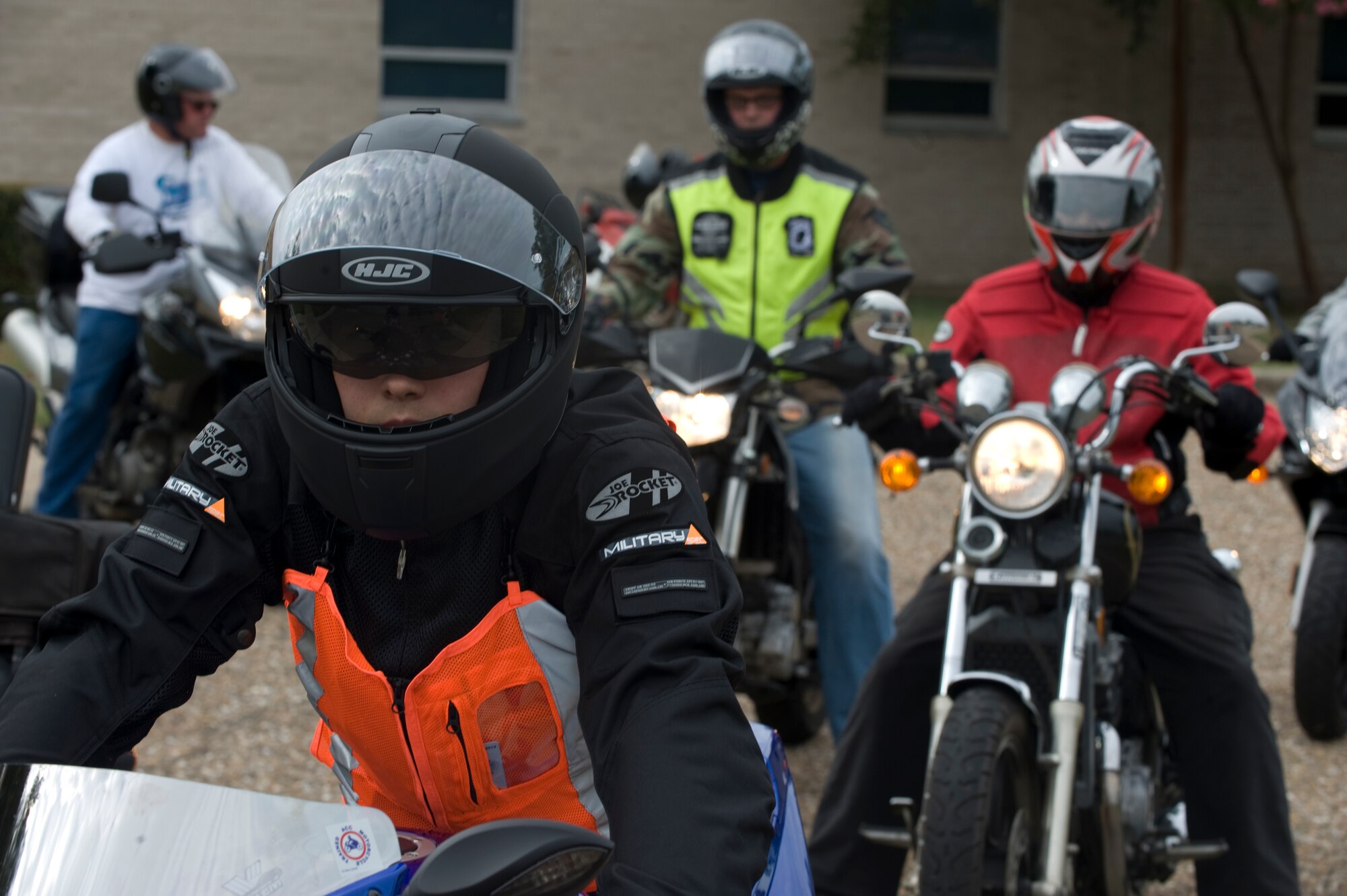 Participants in the Motorcycle Awareness and Remembrance Ride line up in the Chapel 2 parking lot on Barksdale Air Force Base, La., July 29. The riders split into smaller groups and left in three minute intervals to make the ride safer. (U.S.  Air Force photo/Airman 1st Class Micaiah Anthony)(RELEASED)
