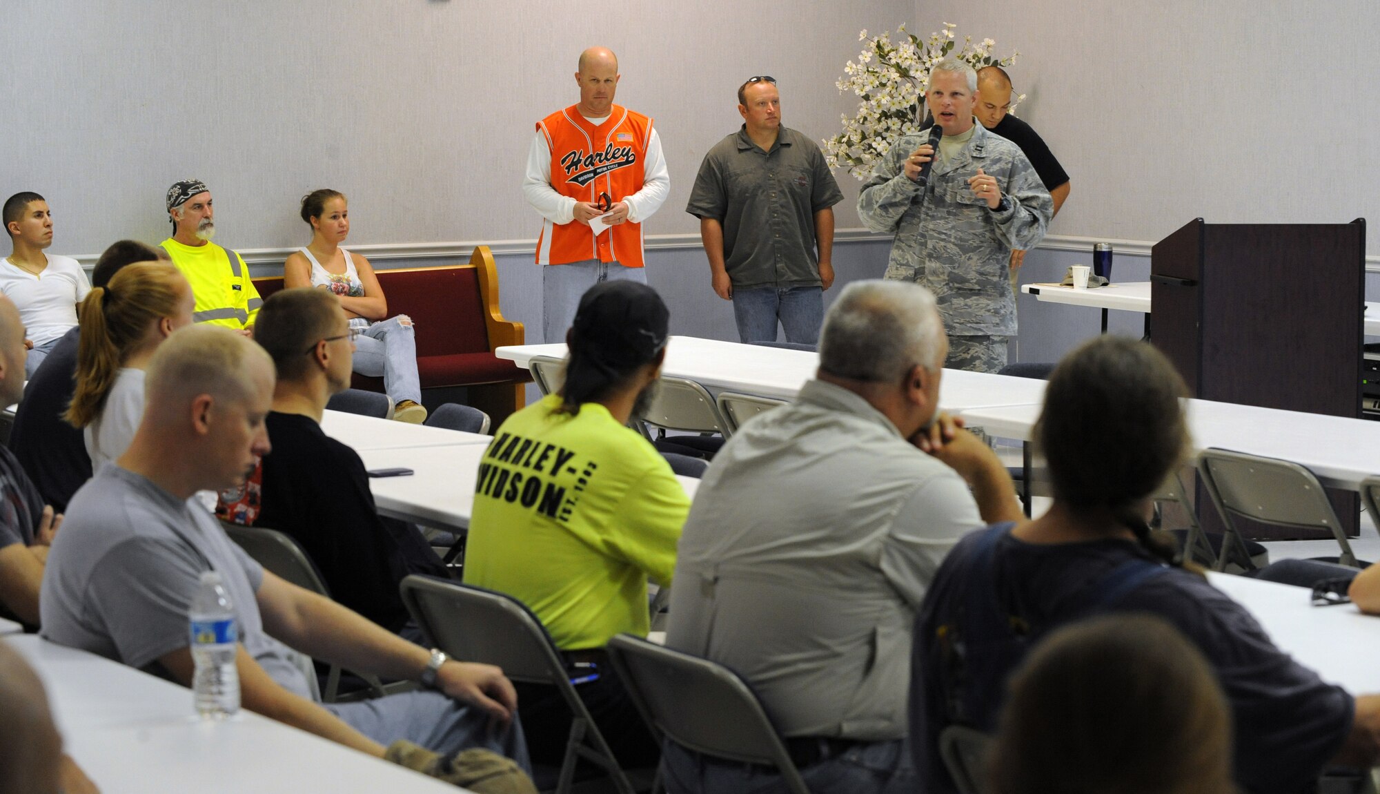 Capt. Richard Holmes, 2nd Maintenance and 2nd Operations Group Chaplain, brief participants on the importance of motorcycle safety before the Motorcycle Awareness and Remembrance Ride at Chapel 2 on Barksdale Air Force Base, La., July 29. The event began with an hour-long briefing followed by a 71-mile ride that took the group 2 hours to complete. (U.S.  Air Force photo/Airman 1st Class Micaiah Anthony)(RELEASED)