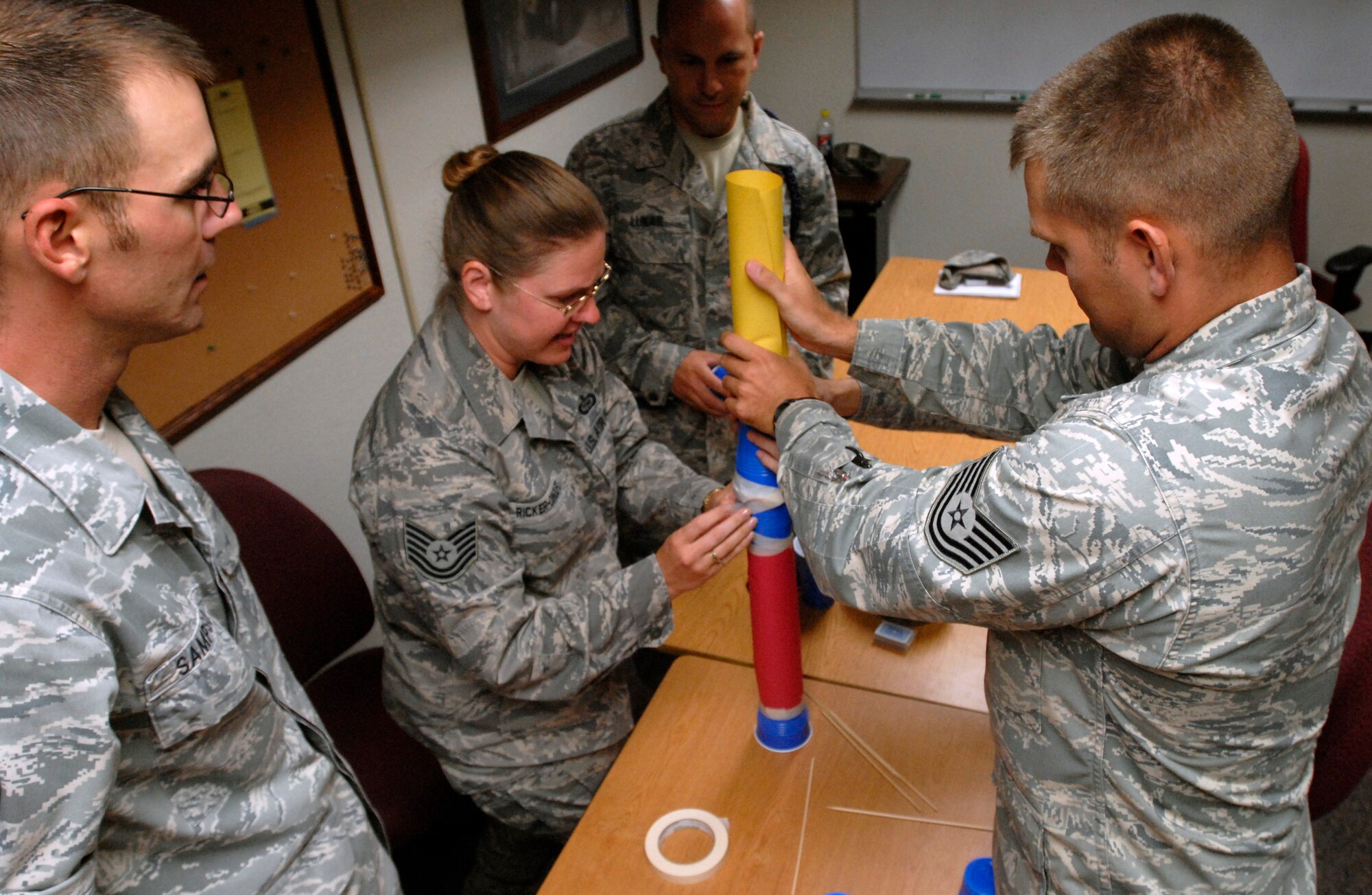 GOODFELLOW AIR FORCE BASE, Texas -- Senior NCO selects take part in a “tallest tower” team building exercise during a senior NCO seminar July 27. Sixteen technical sergeants participated in the event. (U.S. Air Force photo Senior Airman Tong Duong) 