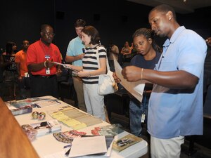 Veteran Administration representatives provide benefit information to inactive reserve members during the Individual Ready Reserve (IRR) Muster at Langley Air Force Base, Va., July 29, 2011. Enlisted Airmen of the IRR are bound to service based on their initial enlistment obligation of eight years, regardless of their active duty service tenure, while officers must report until they voluntarily resign their commission.(U.S. Air Force photo by Staff Sgt. Antoinette Gibson/Released)


