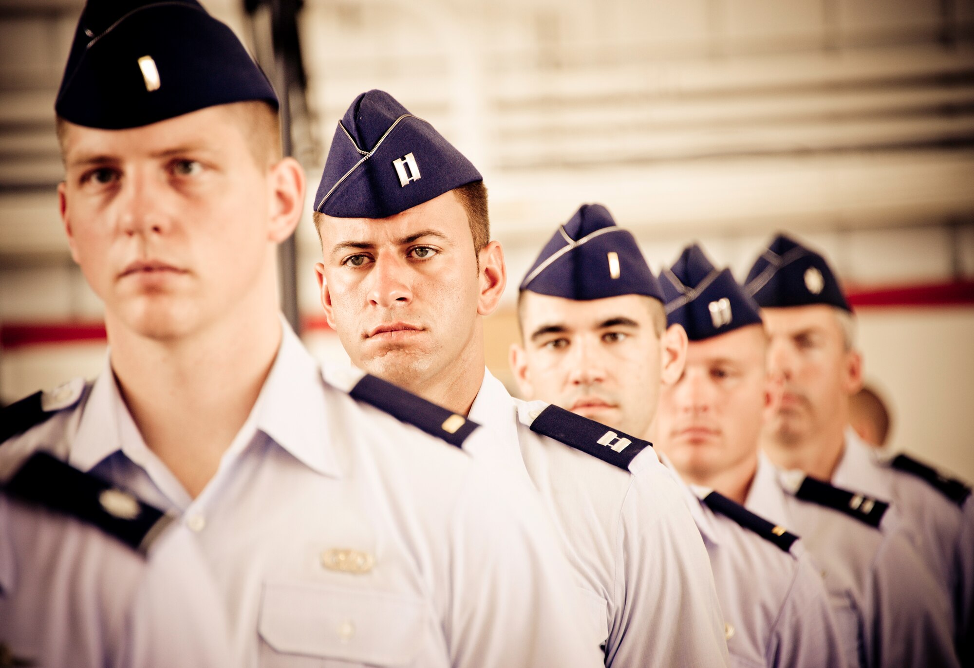 A line of Airmen wait for a change of command ceremony at Eglin Air Force Base, Fla.  (U.S. Air Force photo/Samuel King Jr.)