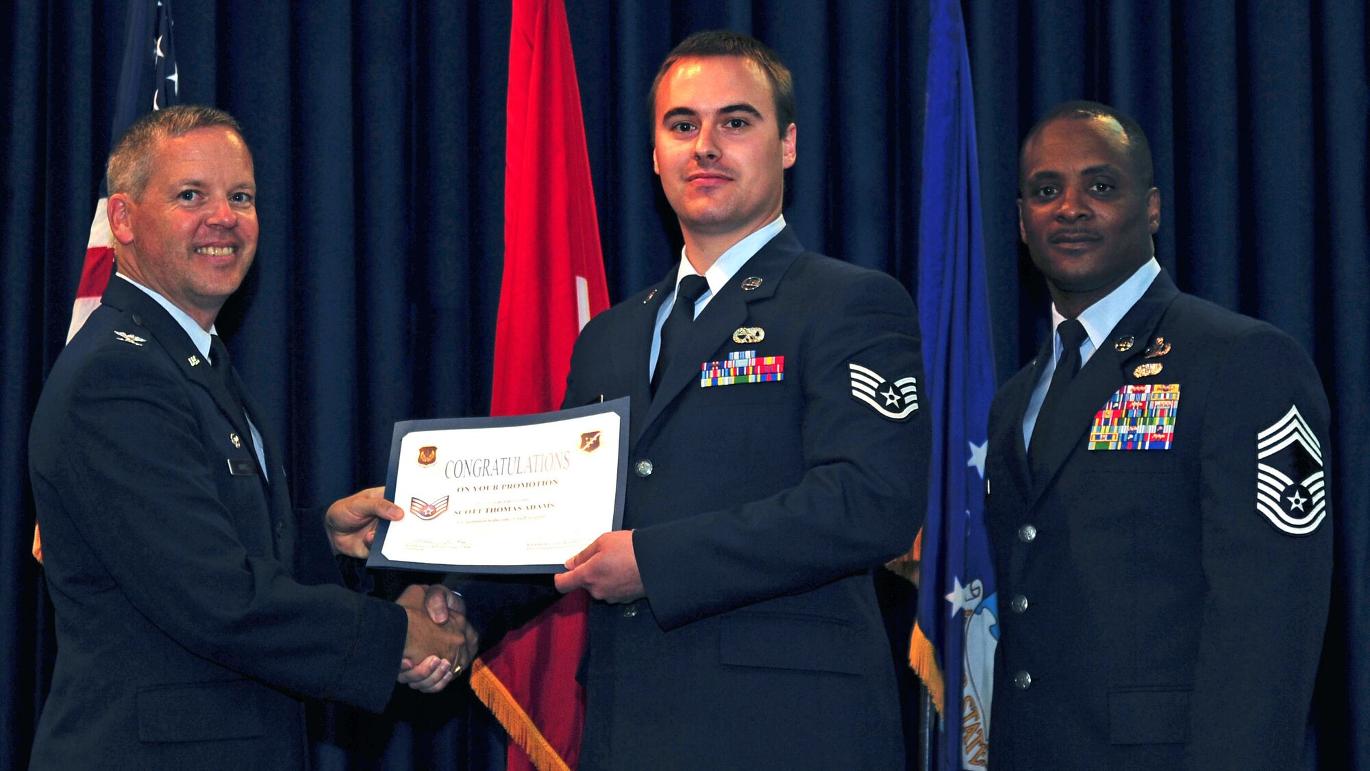 Scott Adams, 728th Air Mobility Squadron, is promoted to the rank of staff sergeant July 29, 2011, at the Club Complex ballroom at Incirlik Air Base, Turkey. (U.S. Air Force photo by Senior Airman Anthony Sanchelli/Released)

