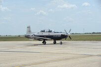 Lt. Col. John Turnipseed), 559th Flying Training Squadron instructor pilot and Air Force Academy Cadet Arturas Kucharevas, a foreign exchange student from Lithuania, taxi to take off during his orientation flight in the T-6 Texan II  (U.S. Air Force photo/Rich McFadden) (released)