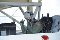Air Force Academy Cadet Arturas Kucharevas, a foreign exchange student from Lithuania, performs final checks  before his orientation flight in the T-6 Texan II aircraft at Randolph Air Force Base July 19. (U.S. Air Force photo/Rich McFadden) (released)