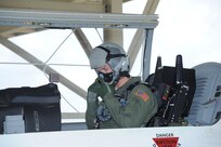 Air Force Academy Cadet Arturas Kucharevas, a foreign exchange student from Lithuania, performs final checks  before his orientation flight in the T-6 Texan II aircraft at Randolph Air Force Base July 19. (U.S. Air Force photo/Rich McFadden) (released)