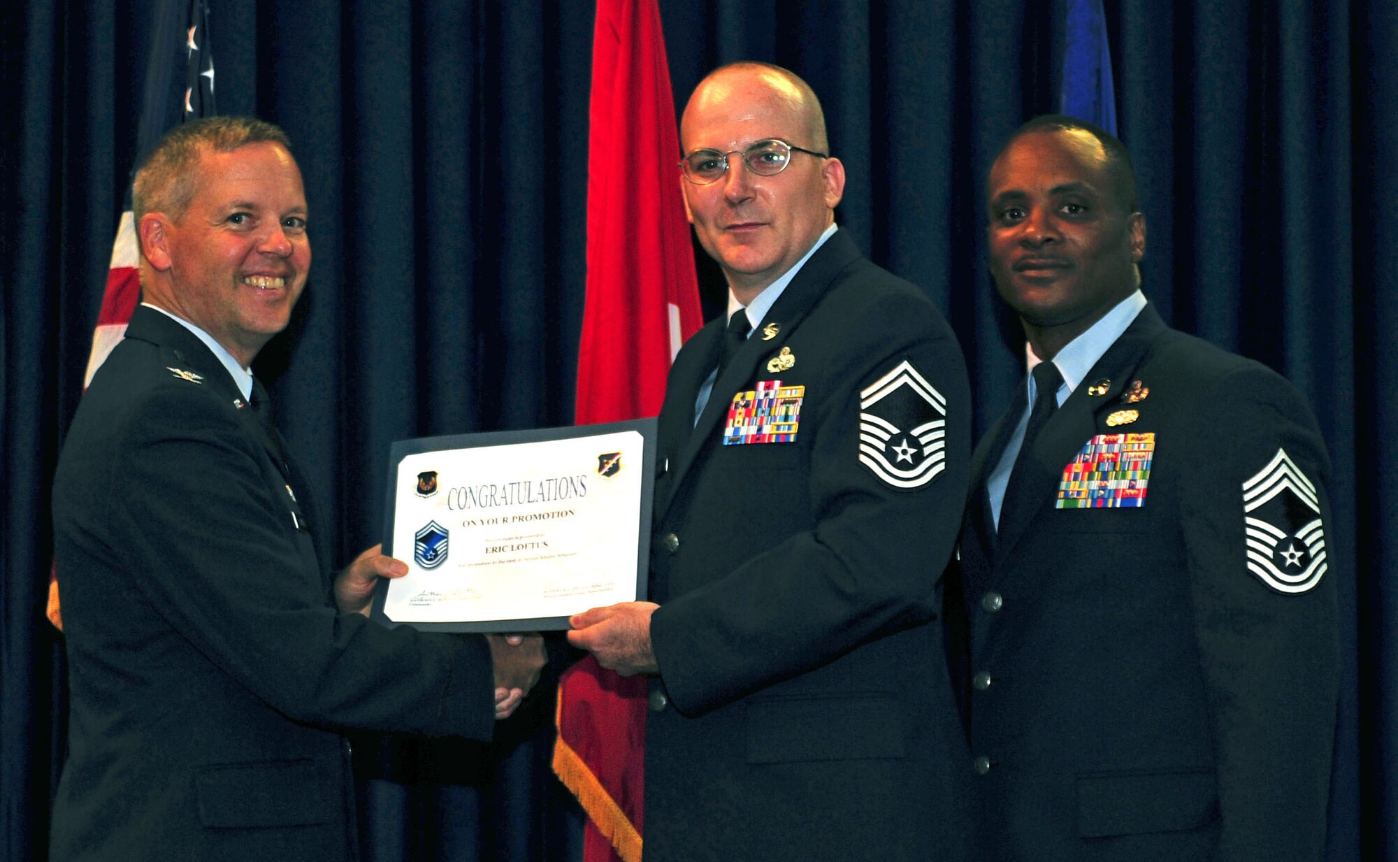 Eric Loftus, 39th Maintenance Squadron, is promoted to the rank of senior master sergeant July 29, 2011, at the Club Complex ballroom at Incirlik Air Base, Turkey. (U.S. Air Force photo by Senior Airman Anthony Sanchelli/Released)