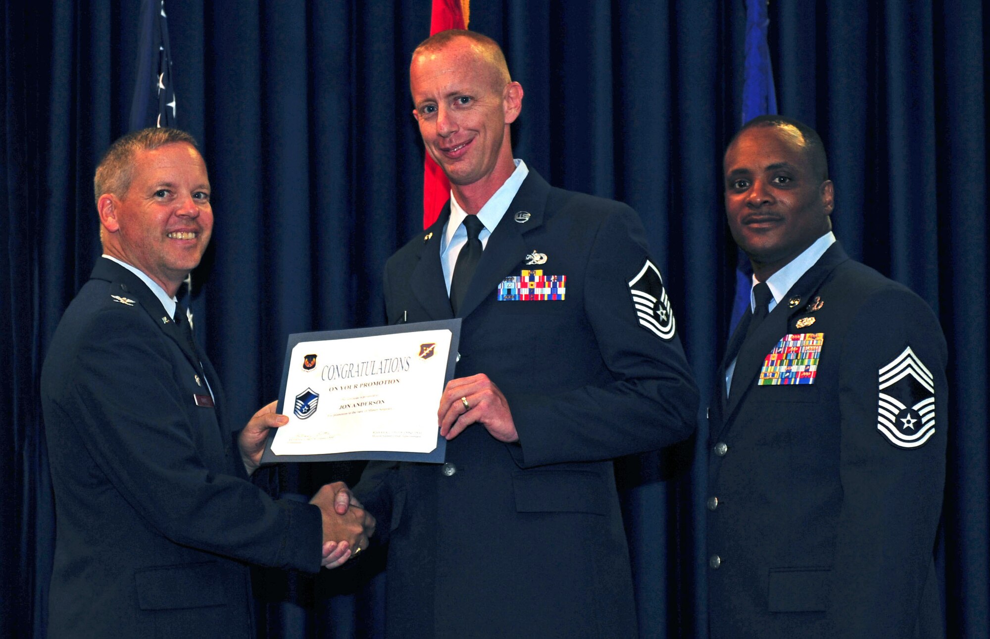 Jon Anderson, 728th Air Mobility Squadron, is promoted to the rank of master sergeant July 29, 2011, at the Club Complex ballroom at Incirlik Air Base, Turkey. (U.S. Air Force photo by Senior Airman Anthony Sanchelli/Released)