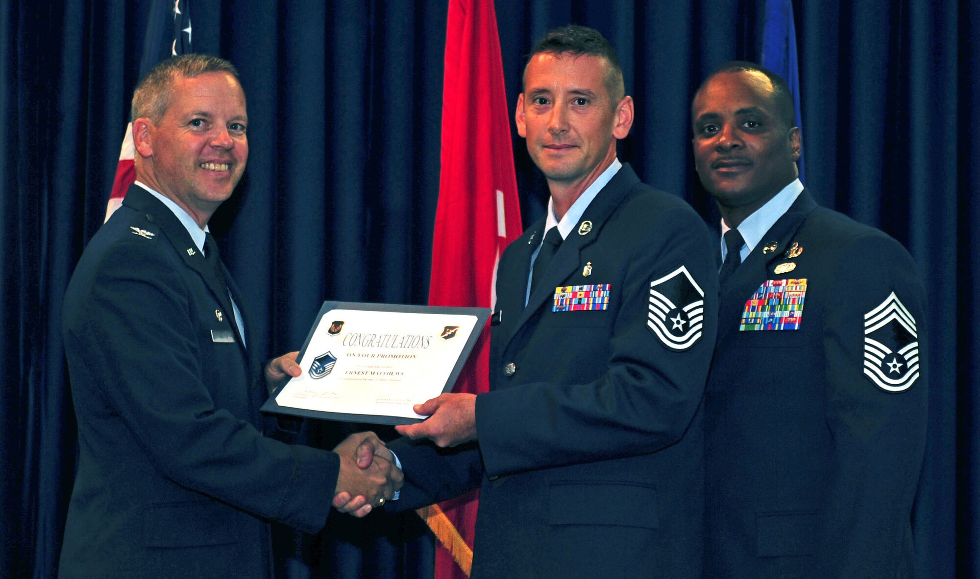 Ernest Matthews, 39th Medical Operations Squadron, is promoted to the rank of master sergeant July 29, 2011, at the Club Complex ballroom at Incirlik Air Base, Turkey. (U.S. Air Force photo by Senior Airman Anthony Sanchelli/Released)