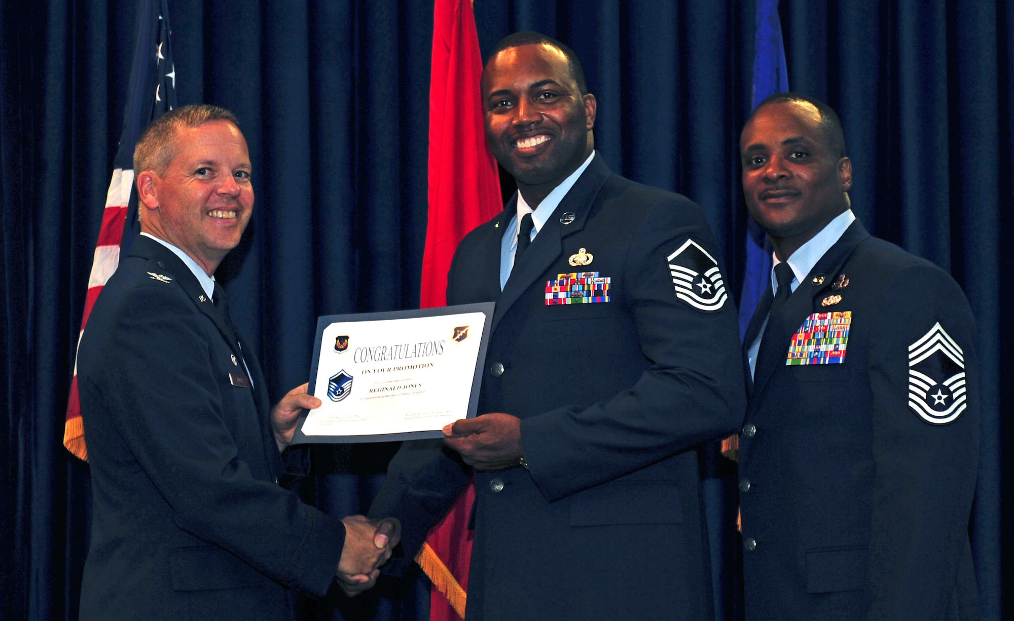 Reginald Jones, 39th Logistics Readiness Squadron, is promoted to the rank of master sergeant July 29, 2011, at the Club Complex ballroom at Incirlik Air Base, Turkey. (U.S. Air Force photo by Senior Airman Anthony Sanchelli/Released)