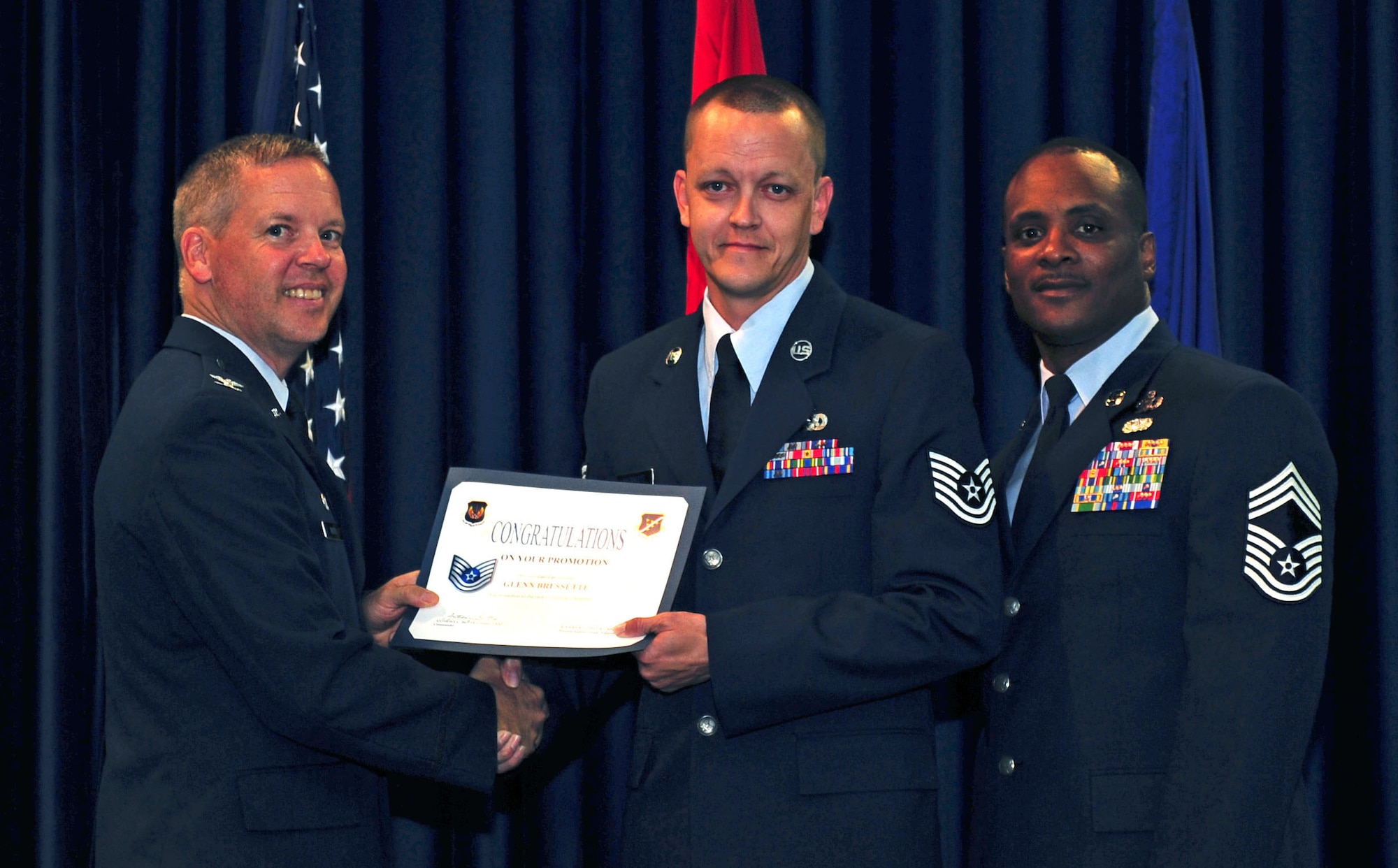 Glenn Bressette, 728th Air Mobility Squadron, is promoted to the rank of technical sergeant July 29, 2011, at the Club Complex ballroom at Incirlik Air Base, Turkey. (U.S. Air Force photo by Senior Airman Anthony Sanchelli/Released)


