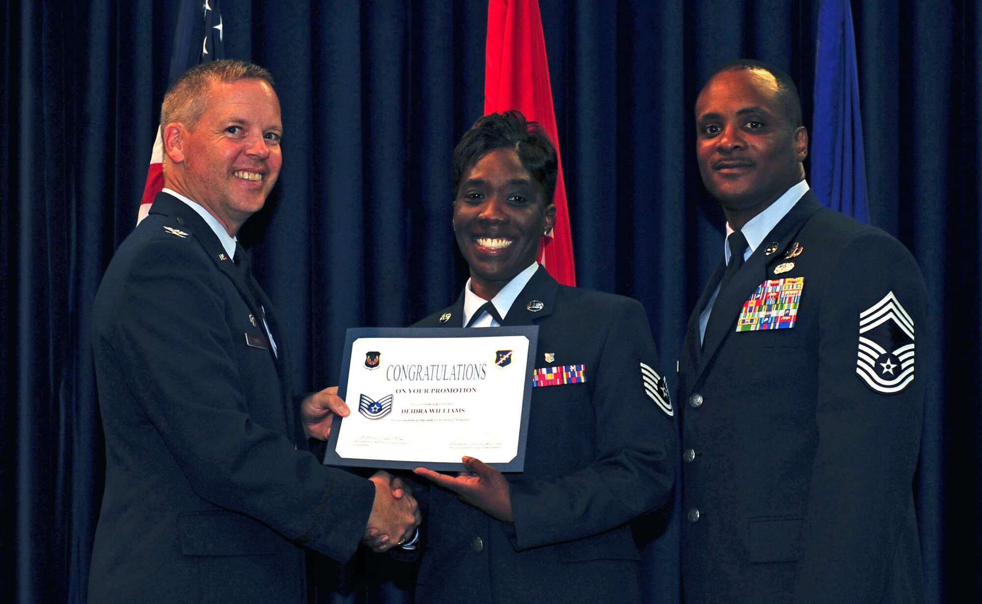 Deidra Williams, 39th Medical Operations Squadron, is promoted to the rank of technical sergeant July 29, 2011, at the Club Complex ballroom at Incirlik Air Base, Turkey. (U.S. Air Force photo by Senior Airman Anthony Sanchelli/Released)


