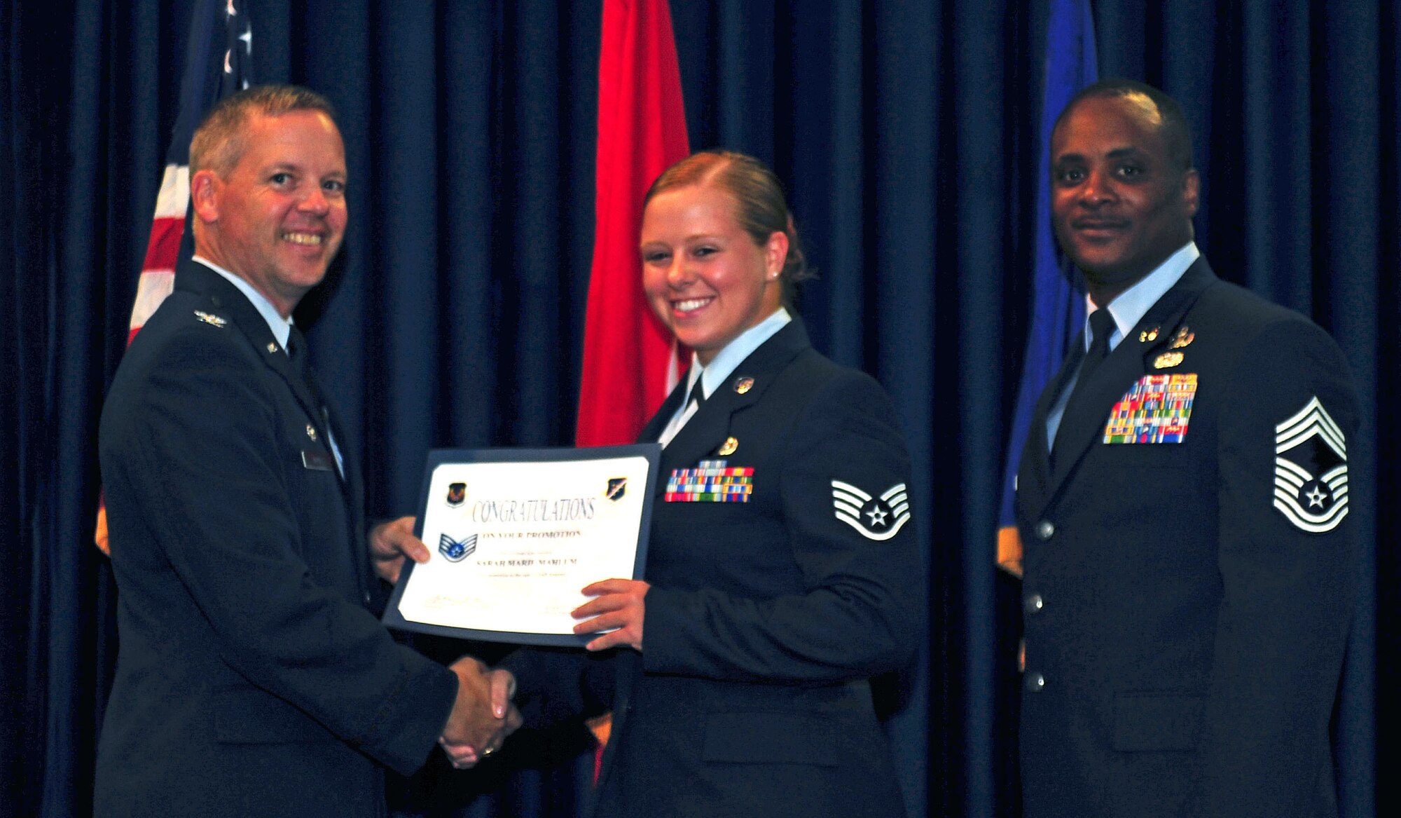 Nicole Mack, 39th Force Support Squadron, is promoted to the rank of staff sergeant July 29, 2011, at the Club Complex ballroom at Incirlik Air Base, Turkey. (U.S. Air Force photo by Senior Airman Anthony Sanchelli/Released)

