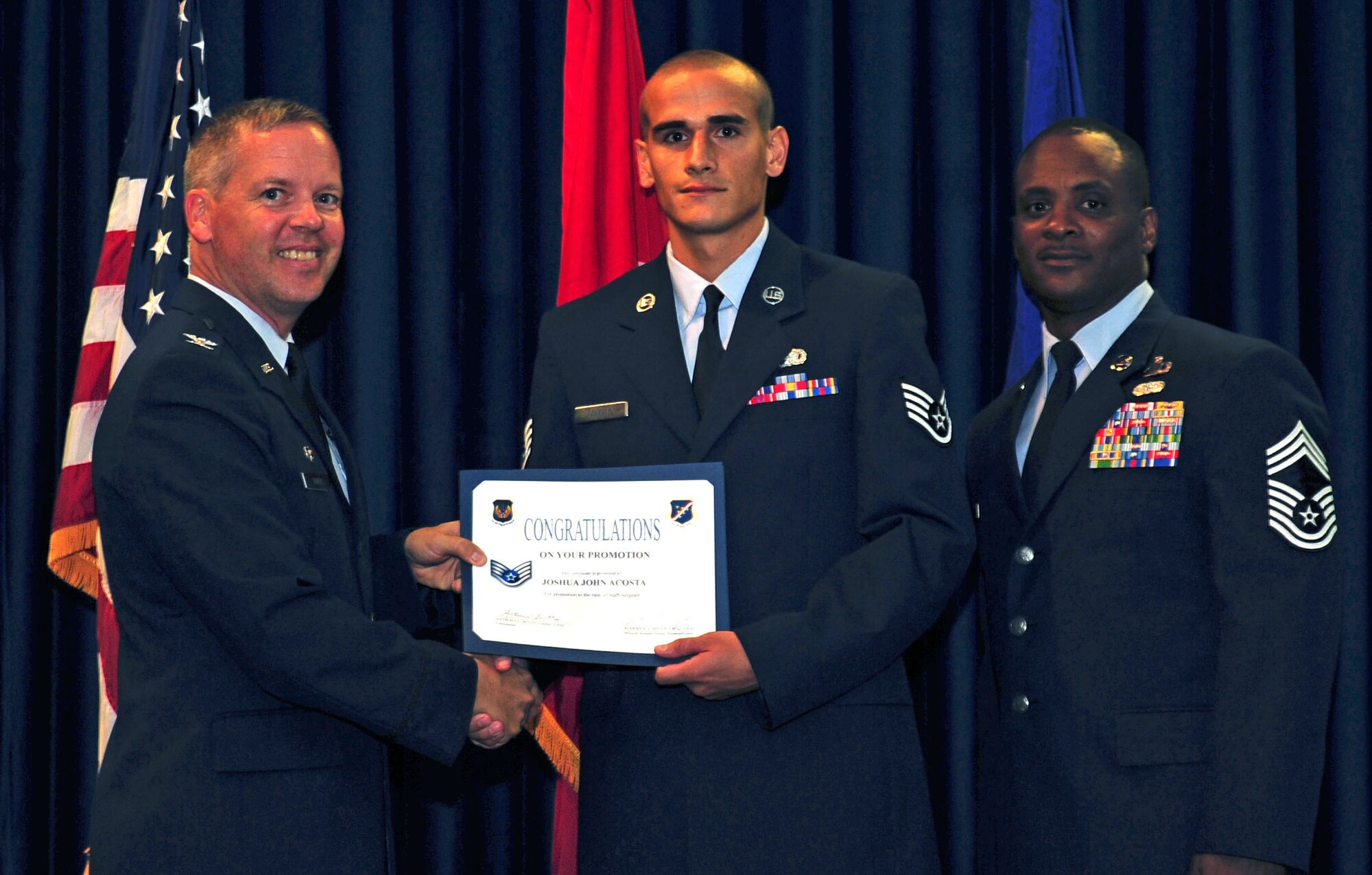 Joshua Acosta, 39th Logistics Readiness Squadron, is promoted to the rank of staff sergeant July 29, 2011, at the Club Complex ballroom at Incirlik Air Base, Turkey. (U.S. Air Force photo by Senior Airman Anthony Sanchelli/Released)
