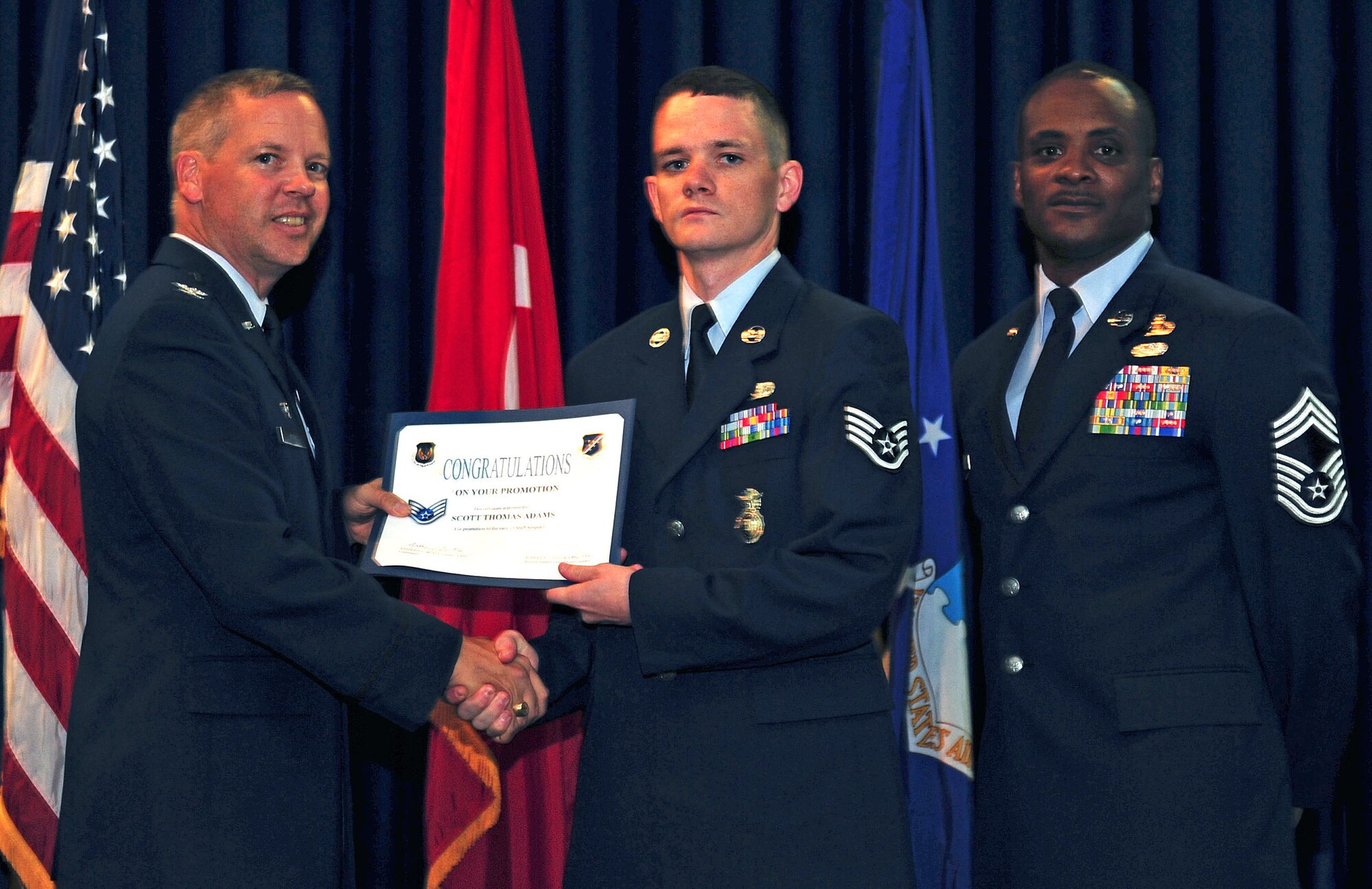 Andrew Cockerham, 39th Security Forces Squadron, is promoted to the rank of staff sergeant July 29, 2011, at the Club Complex ballroom at Incirlik Air Base, Turkey. (U.S. Air Force photo by Senior Airman Anthony Sanchelli/Released)