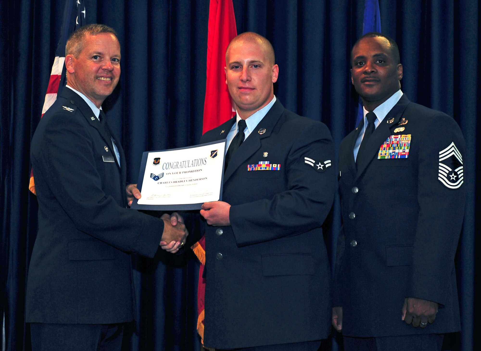 Charles Henderson, 39th Medical Support Squadron, is promoted to the rank of staff sergeant July 29, 2011, at the Club Complex ballroom at Incirlik Air Base, Turkey. (U.S. Air Force photo by Senior Airman Anthony Sanchelli/Released)