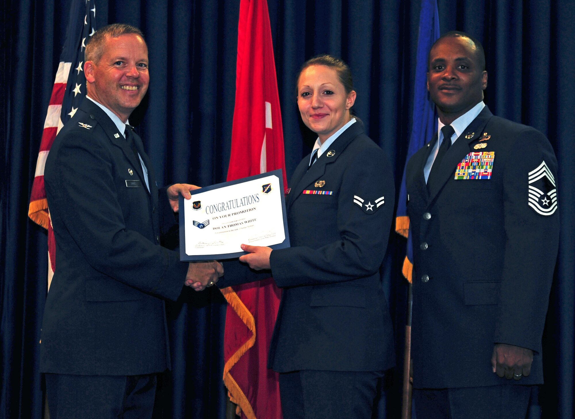 Megan Rocamontes, 39th Communications Squadron, is promoted to the rank of senior airman July 29, 2011, at the Club Complex ballroom at Incirlik Air Base, Turkey. (U.S. Air Force photo by Senior Airman Anthony Sanchelli/Released)

