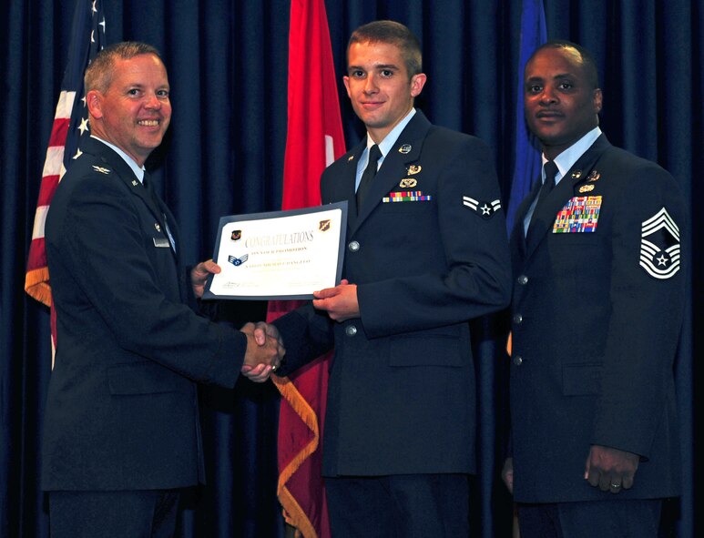 Aaron D'Angelo, 39th Civil Engineer Squadron, is promoted to the rank of senior airman July 29, 2011, at the Club Complex ballroom at Incirlik Air Base, Turkey. (U.S. Air Force photo by Senior Airman Anthony Sanchelli/Released)
