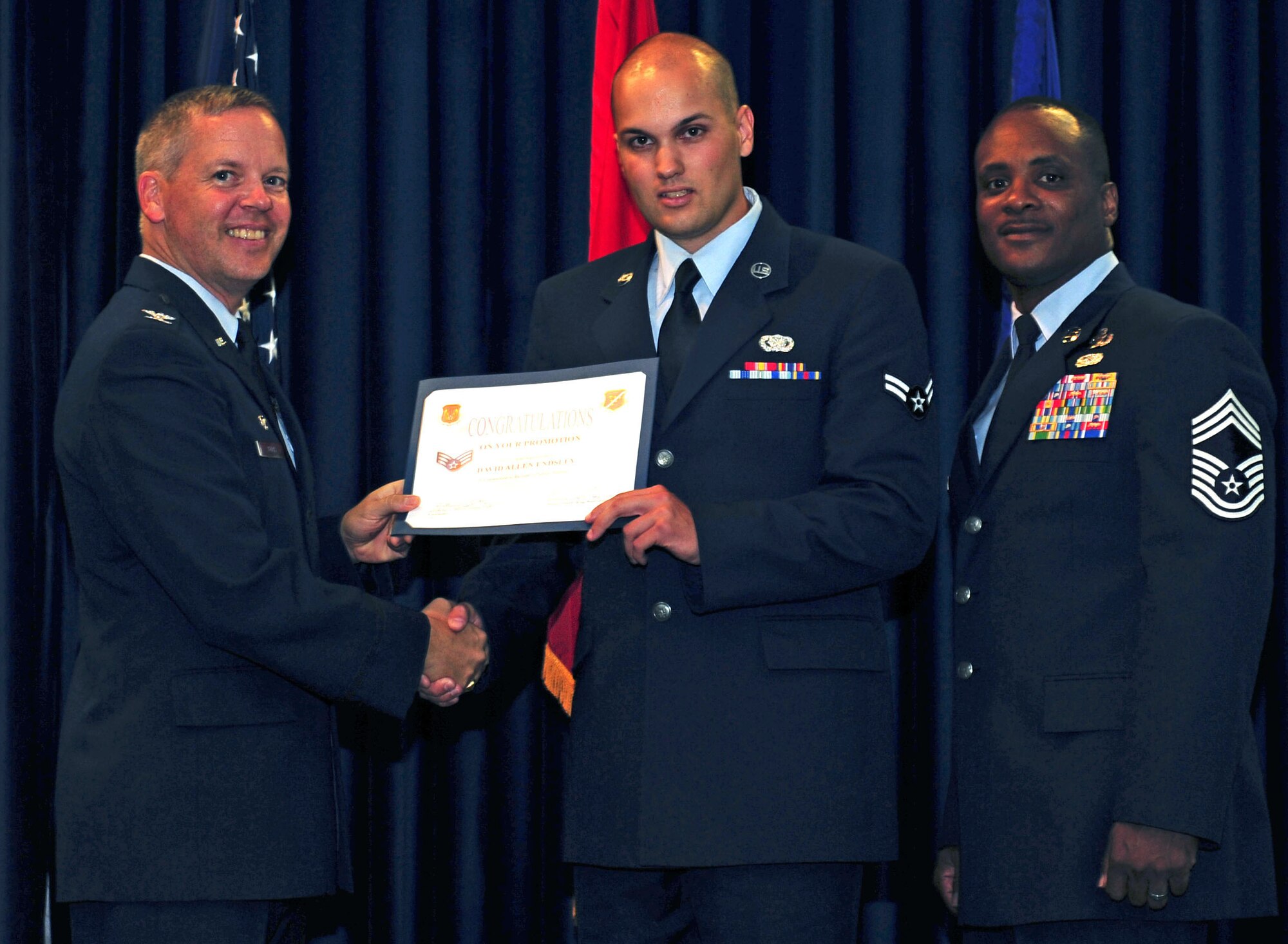 David Endsley, 39th Logistics Readiness Squadron, is promoted to the rank of senior airman July 29, 2011, at the Club Complex ballroom at Incirlik Air Base, Turkey. (U.S. Air Force photo by Senior Airman Anthony Sanchelli/Released)
