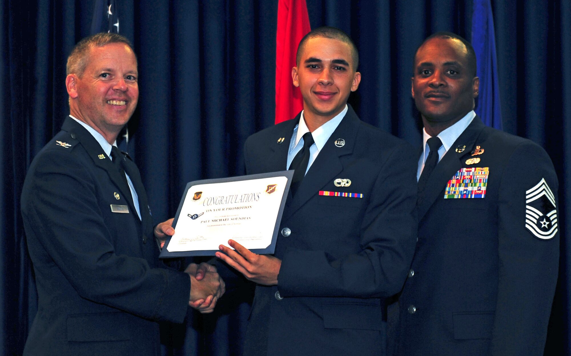 Paul Soundias, 39th Air Base Wing Staff Agencies, is promoted to the rank of airman July 29, 2011, at the Club Complex ballroom at Incirlik Air Base, Turkey. (U.S. Air Force photo by Senior Airman Anthony Sanchelli/Released)