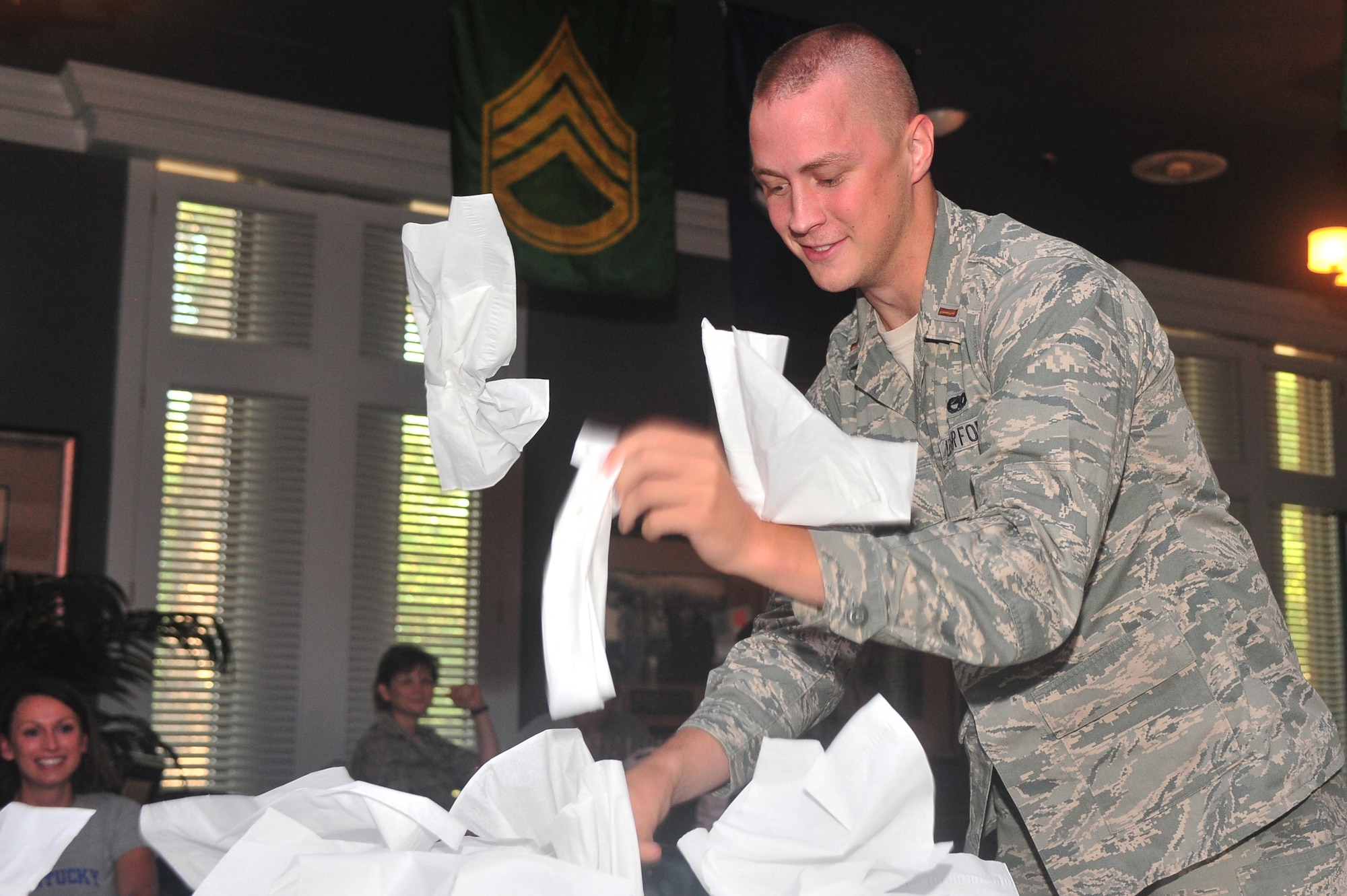 U.S. Air Force 2nd Lt. Shawn Sullivan, Equipment Maintenance Squadron, participates in a “Minute to Win It”, competition as the tissue box contest gets underway, Shaw Air Force Base, S. C. July 20, 2011. The “Minute to Win It” competition brought Airman together and showcased squadron’s teamwork. (U.S. Air Force photo by Airman 1st Class Ashley Gardner/ Released)