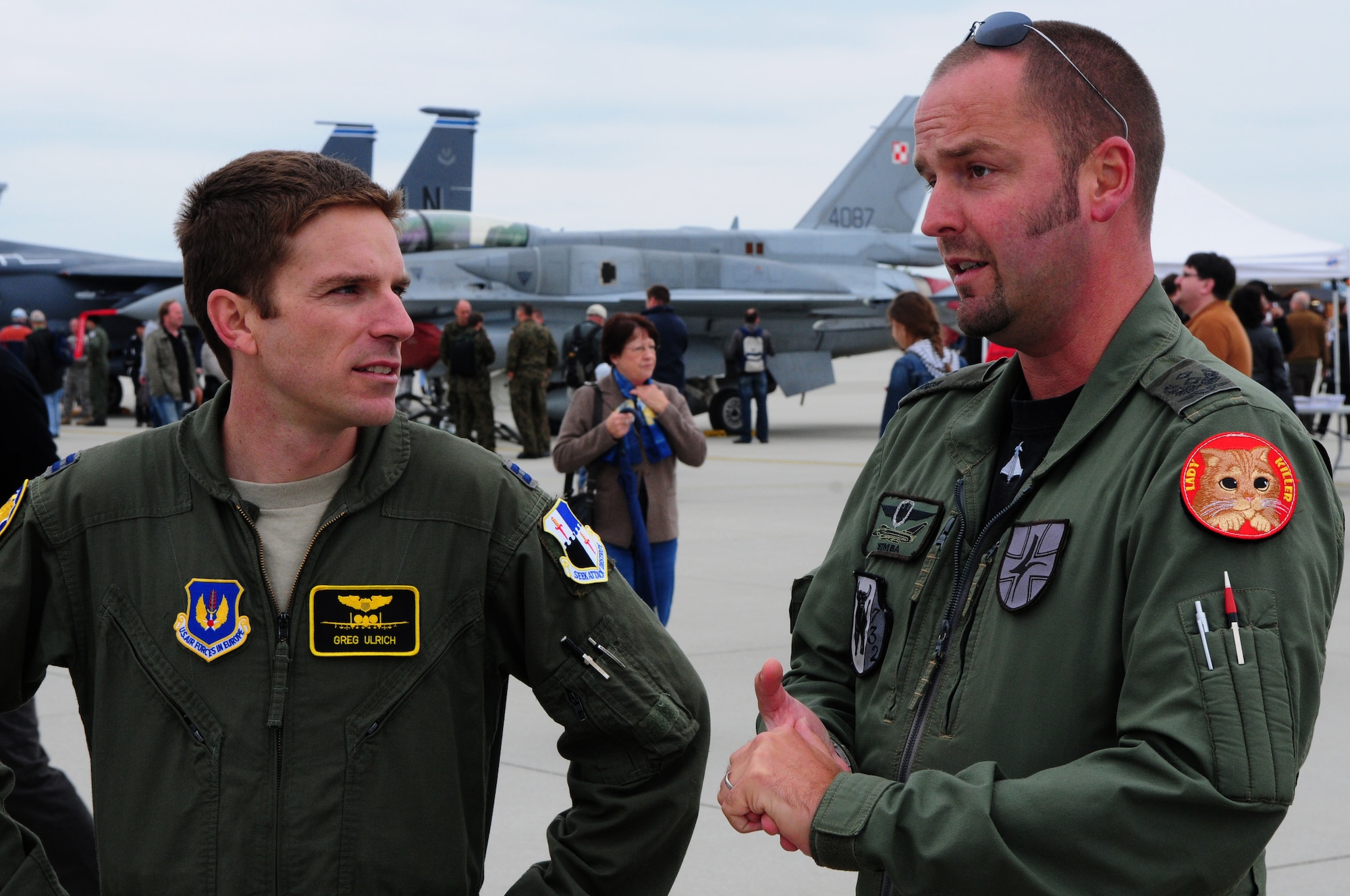 SPANGDAHLEM AIR BASE, Germany – German air force Lt. Col. Sebastion Leo, right, a pilot for Fighter Wing 73, speaks with Capt. Greg Ulrich, 81st Fighter Squadron A-10 Thunderbolt II pilot, during the Spangdahlem Air Base Open House 2011 here July 31. The 52nd Fighter Wing invited the public onto the base to demonstrate the capabilities of the U.S. and its NATO partners. (U.S. Air Force photo/Airman 1st Class Matthew B. Fredericks)