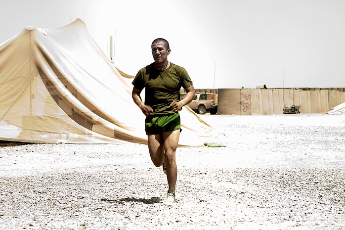 Lance Cpl. Jose Contreras sprints 200 meters as part of the Rankel Workout here, Aug. 1. Contreras, a native of San Antonio, is a team leader with Charlie Company, 1st Battalion, 3rd Marine Regiment. The Rankel workout is dedicated to Sgt. John Rankel, who died while deployed here in 2010.