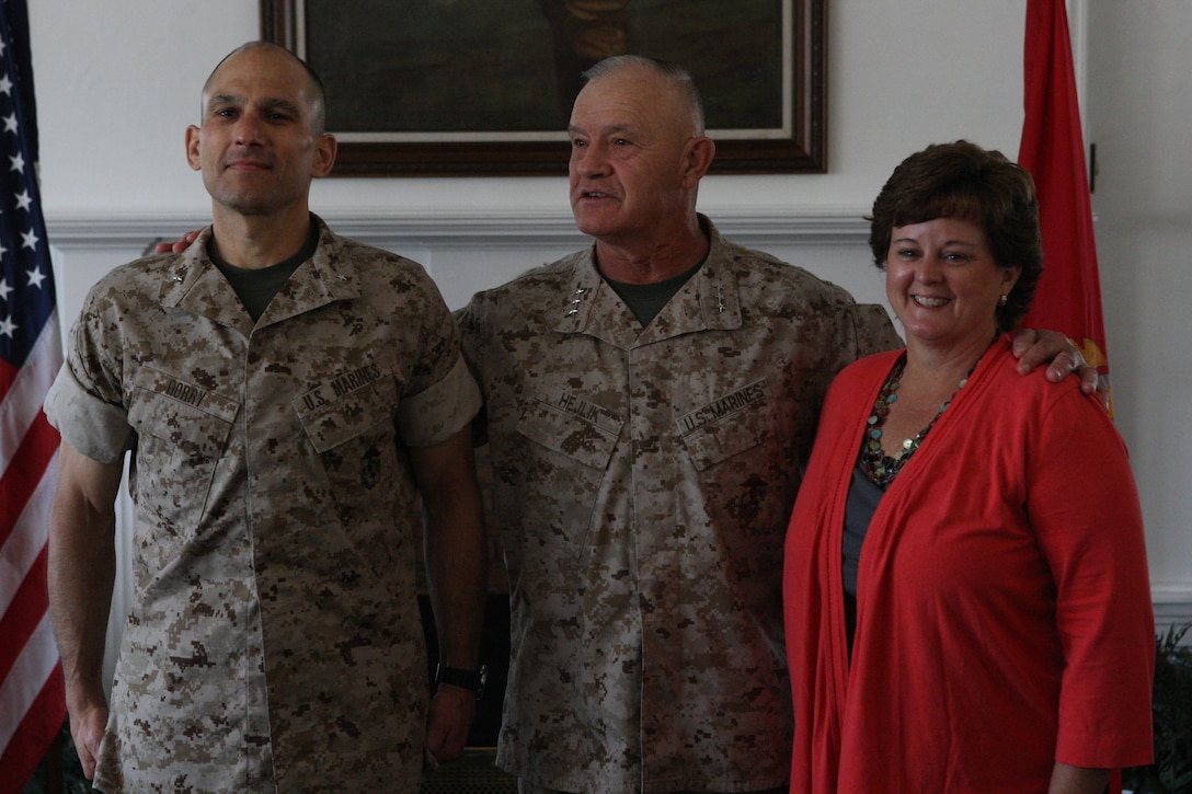 Lt. Gen. Dennis J. Hejlik, commanding general of Fleet Marine Forces Atlantic, Marine Corps Bases Atlantic and United States Marine Corps Forces Command (center) stands with Brig. Gen. Thomas A. Gorry, commanding general of Marine Corps Installations East, and his wife Kimberlee following his frocking to brigadier general at the Paradise Point Officers’ Club aboard Marine Corps Base Camp Lejeune, Aug. 2.