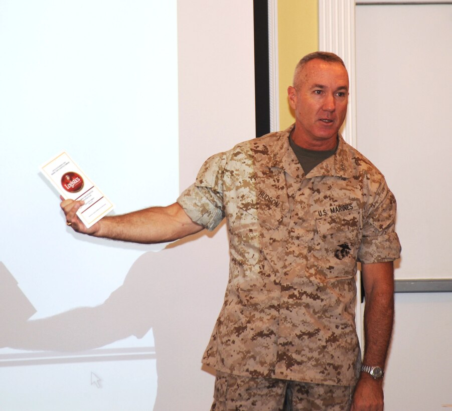 Maj. Gen. Charles L. Hudson, commanding general, Logistics Command, discusses one of the organization's two primary documents during the Leadership Conference here, Aug. 3.