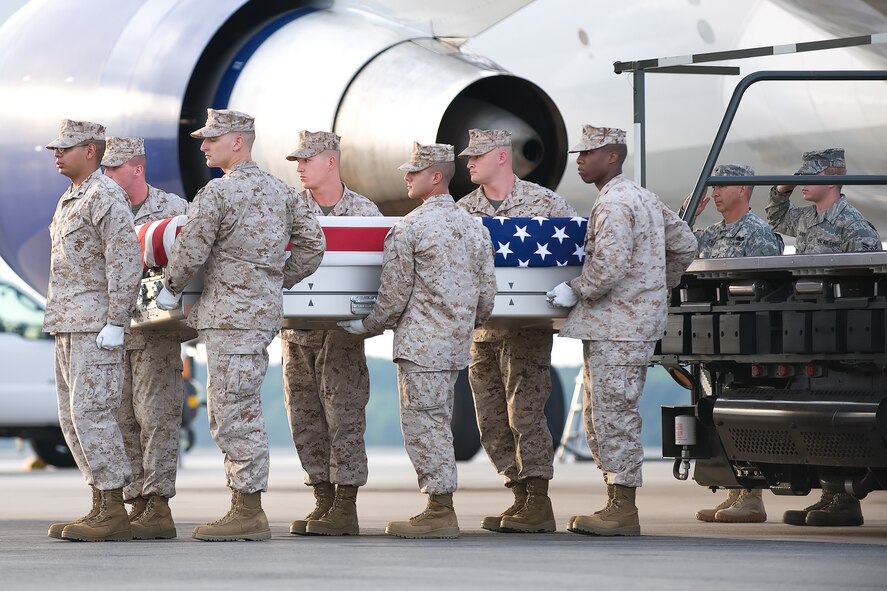 A U.S. Marine Corps carry team transfers the remains of Marine Sgt. Dennis E. Kancler of Brecksville, Ohio, at Dover Air Force Base, Del., Aug. 2, 2011. Kancler was  assigned to 2nd Marine Special Operations Battalion, Marine Special Operations Regiment, U.S. Marine Corps Forces Special Operations Command, Camp Lejeune, N.C. (U.S. Air Force photo/Adrian Rowan)