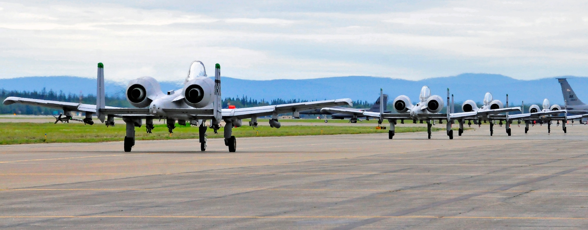 Several A-10 Thunderbolt IIs taxi out for a training mission July 15, 2011, Eielson Air Force Base, Alaska.  During RF-A 11-2, the 25th Fighter Squadron from Osan Air Base, Republic of Korea took advantage of operating in the 67,000-square-mile Joint Pacific Alaska Range Complex and learned valuable lessons that can be applied in combat. The 25th FS A-10 pilots strive to stay proficient in providing close-air support in combat by taking advantage of the Joint Pacific Alaska Range Complex, which provides the means to engage in air to ground maneuvers and expend numerous inert and live weapons. (U.S. Air Force photo by/Staff Sgt. Miguel Lara III)