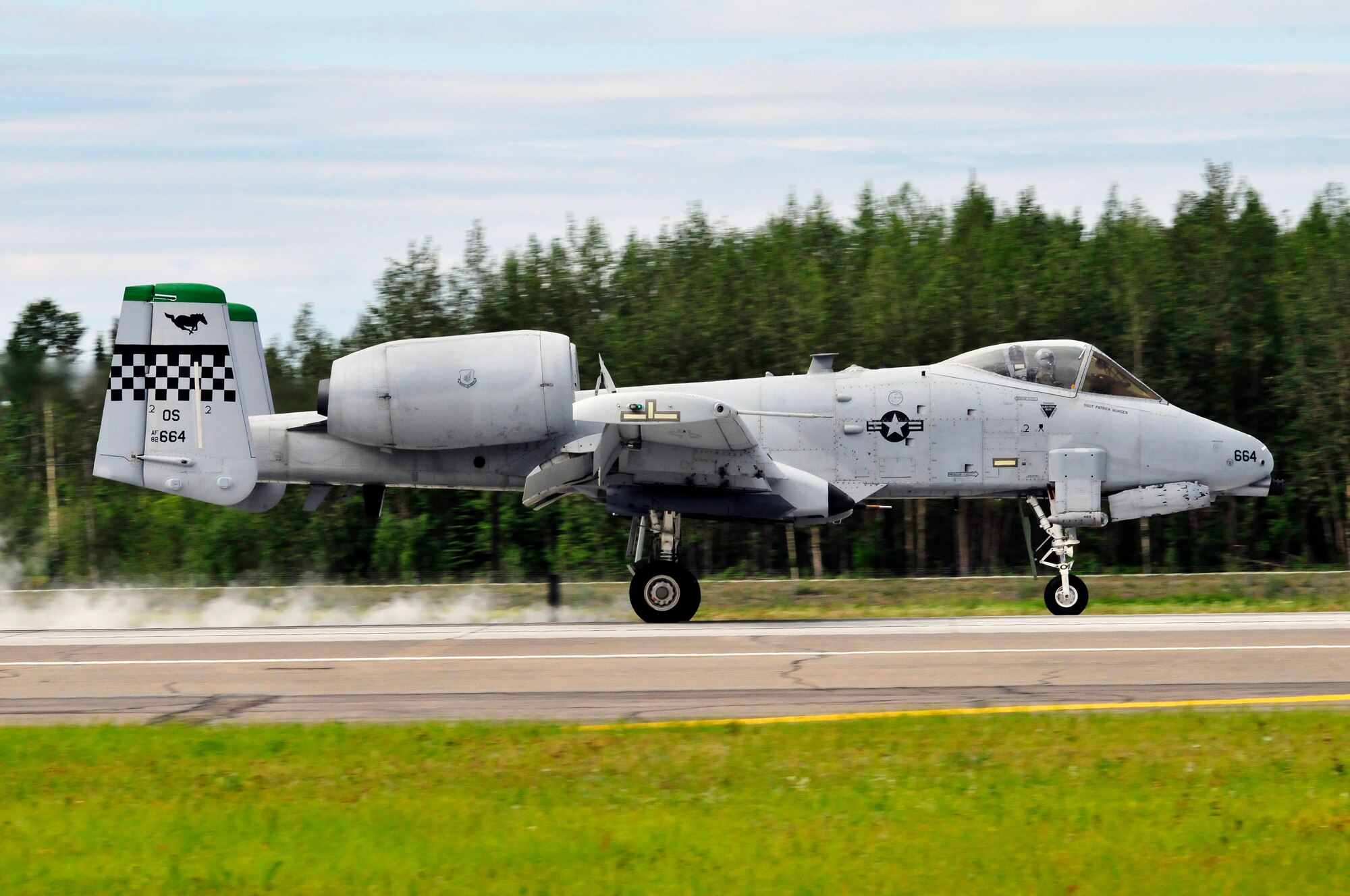 An A-10 Thunderbolt II lands on the runway July 15, 2011, Eielson Air Force Base, Alaska.  Much of the training performed at Eielson is not easily completed by the 25th Fighter Squadron from Osan, Republic of Korea, making large combat training exerices like RED FLAG-Alaska and Distant Frontier critical in helping meet qualifications for A-10 pilots.  By presenting pilots with multiple challenges in the Joint Pacific Alaska Range Complex, the 25th FS can properly exploit the heavy armament and weaponry the A-10 brings to combat and comply with annual training requirements.  (U.S. Air Force photo by/Staff Sgt. Miguel Lara III)