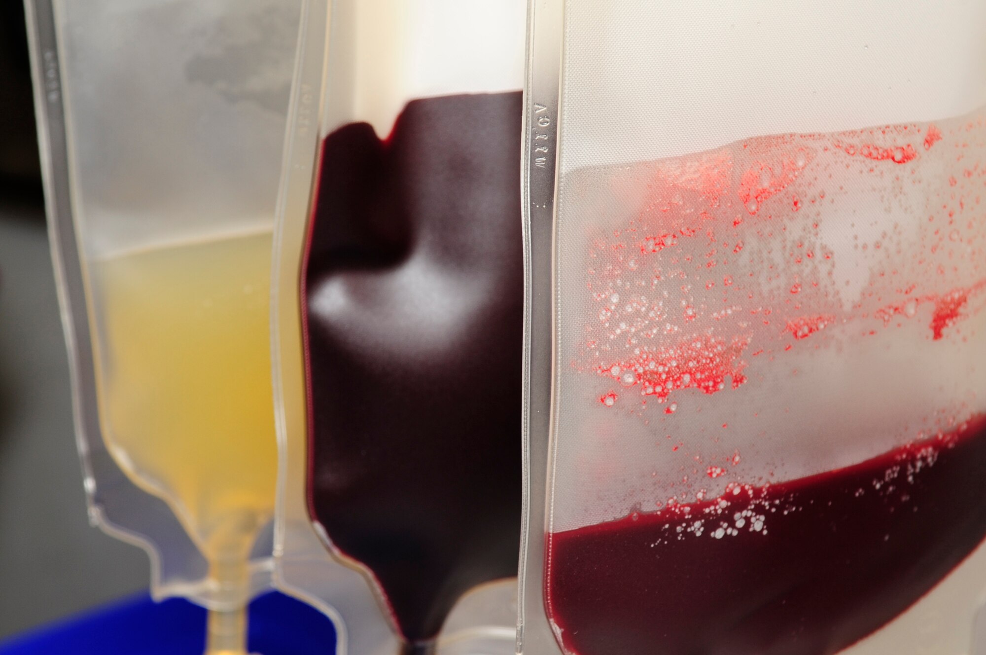 VANDENBERG AIR FORCE BASE, Calif. – Three collection bags hang from a centrifugal machine during the United Blood Services blood drive at the Headquarters Building parking lot here Tuesday, July 26, 2011. The machine is used to separate plasma from red blood cells.  (U.S. Air Force photo/Senior Airman Lael Huss)