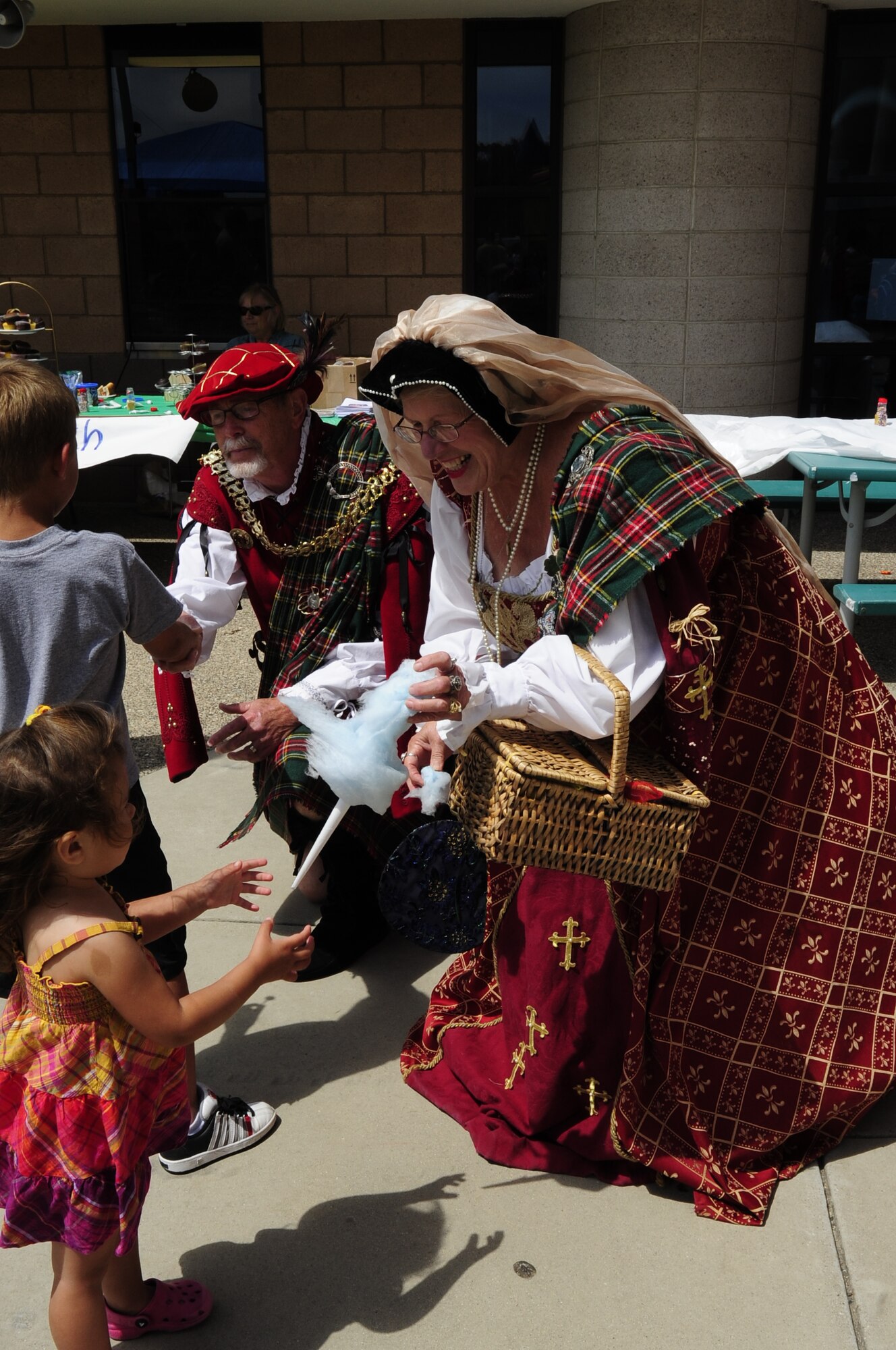 VANDENBERG AIR FORCE BASE, Calif. – Glen and Mary Newcomb wear renaissance era costumes while interacting with children during the Salute to Youth event at the Youth Center here Friday, July 29, 2011.  The Salute to Youth was both an educational and family friendly event.  It hosted the Exceptional Family Member Program, local schools, Backpack Brigade, Disc Jockey, games and prizes. (U.S. Air Force photo/Senior Airman Lael Huss)