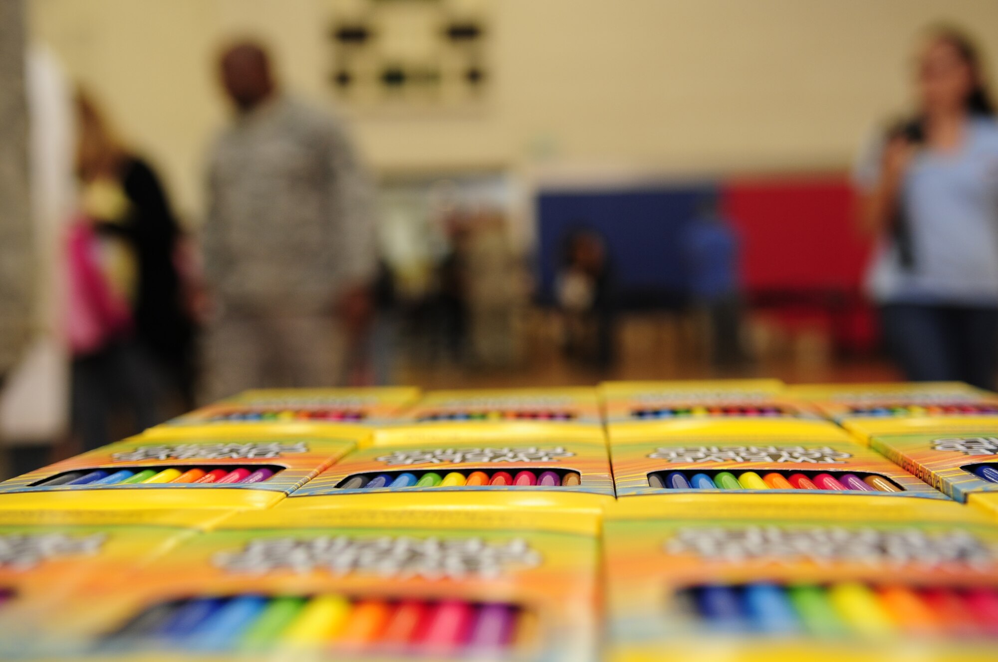 VANDENBERG AIR FORCE BASE, Calif. – School supplies are given out for the Backpack Brigade during the Salute to Youth event at the Youth Center gym here Friday, July 29, 2011. The Backpack Brigade program gives school supplies to families with school-aged children with an income at or below $36,000. (U.S. Air Force photo/Senior Airman Lael Huss)