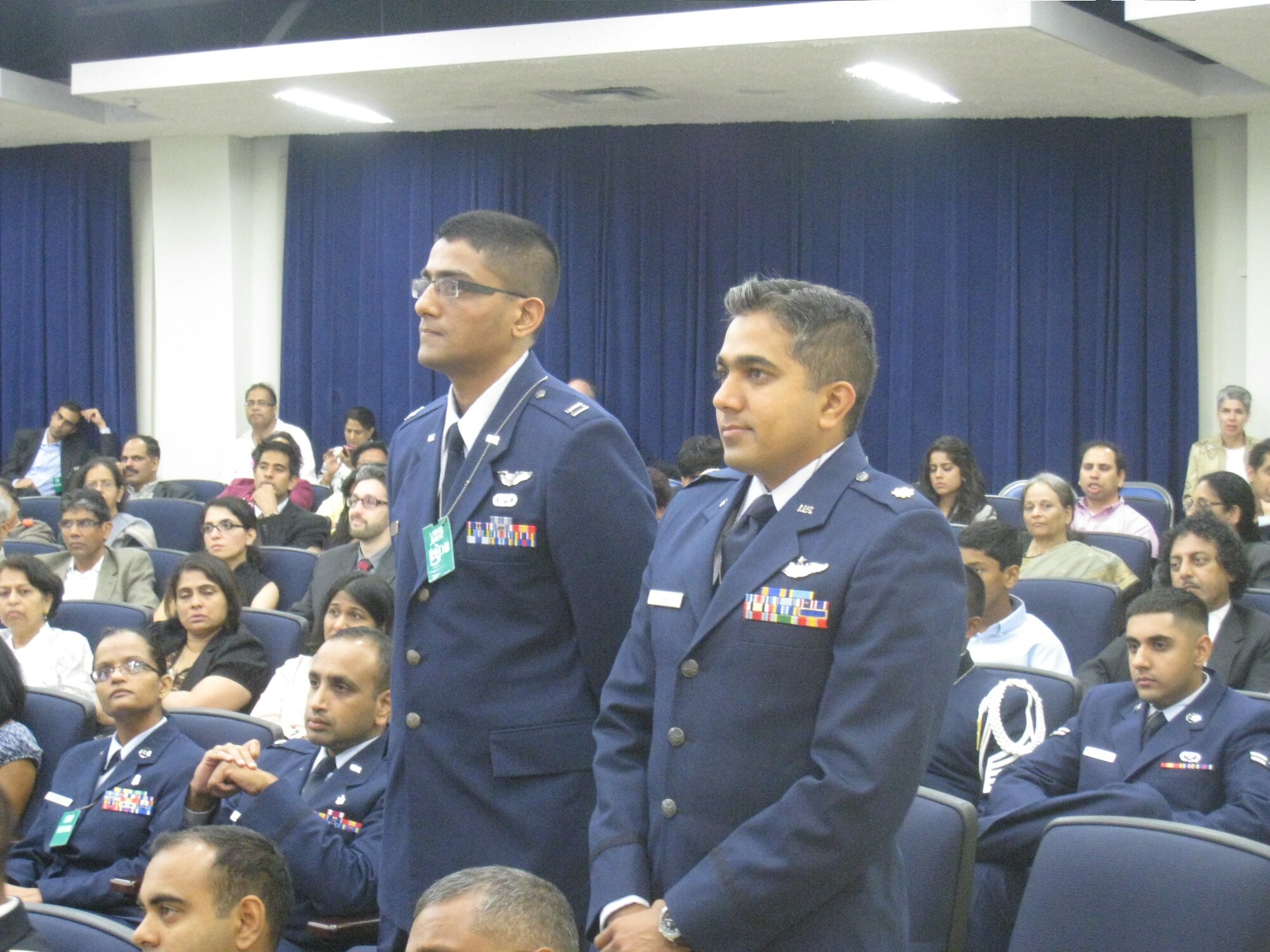 Capt. Iyer Srivats, 349th Air Mobility Wing C-5 pilot, and Maj. Raj
Shah, 177th Fighter Wing F-16 pilot are recognized at a White House summit
July 29, for executing numerous combat missions in Southwest Asia since
Sept. 11, 2001. The summit, "Impacting change in America and abroad,"
recognized the contributions of South Asian Americans. The event marked the
first time South Asian American military heritage was honored at the White
House. (U.S. Air Force photo/courtesy photo)
