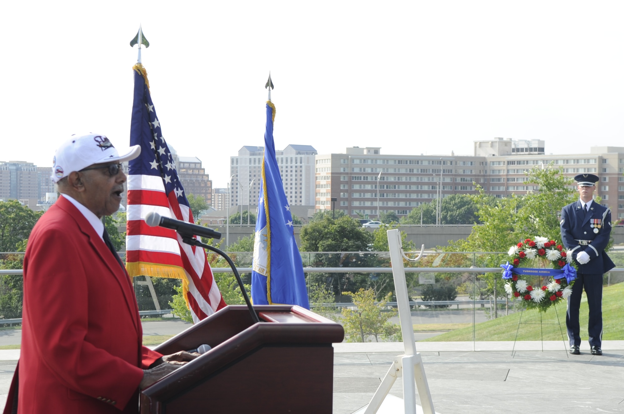 Jim Pryde, a Tuskegee Airmen who served with the Army Air Corps 477th Medium Bombardment Group as a combat crewman, speaks at a wreath laying ceremony July 31, in Washington D.C., at the Air Force Memorial. Pryde was one of a handful of Tuskegee Airman in attendance. About 400 of the original Tuskegee Airmen remain. (U.S. Air Force photo by Staff Sgt. Raymond Mills) 